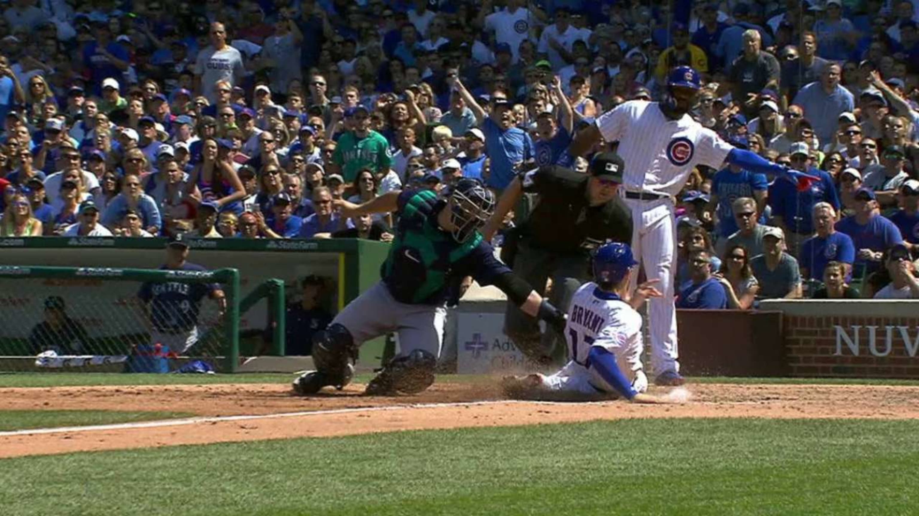 Martin's 2-run double off Chapman leads M's over Cubs 4-1