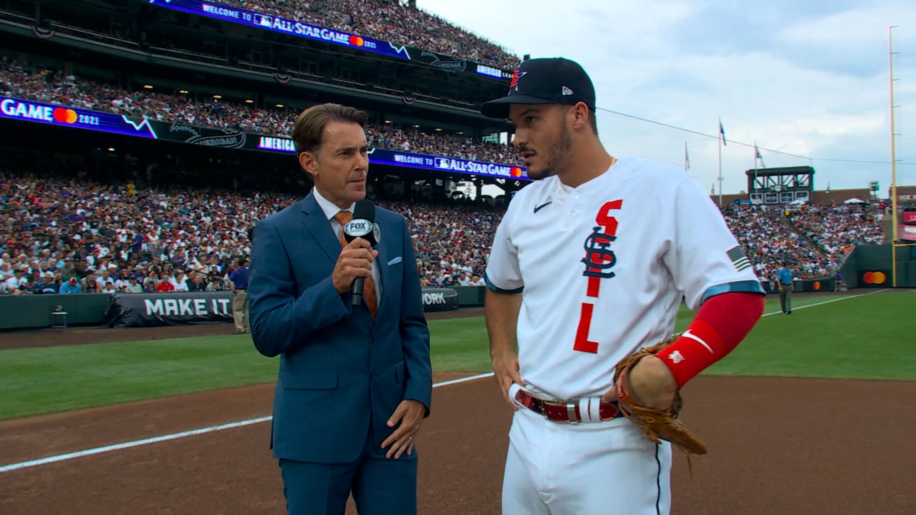 Nolan Arenado stars as a Cardinal at Coors Field