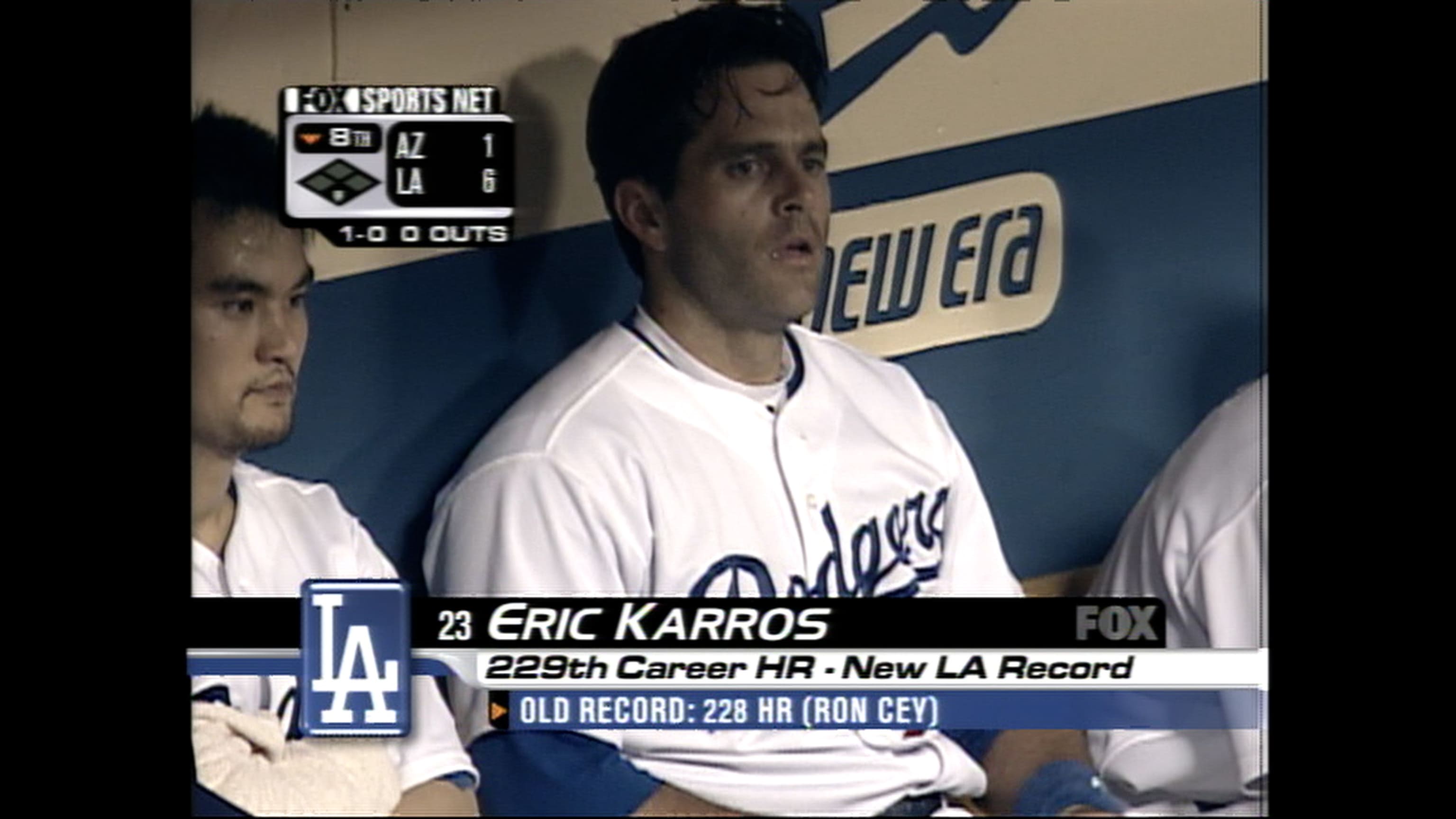 Eric Karros in dugout as son Kyle Karros plays
