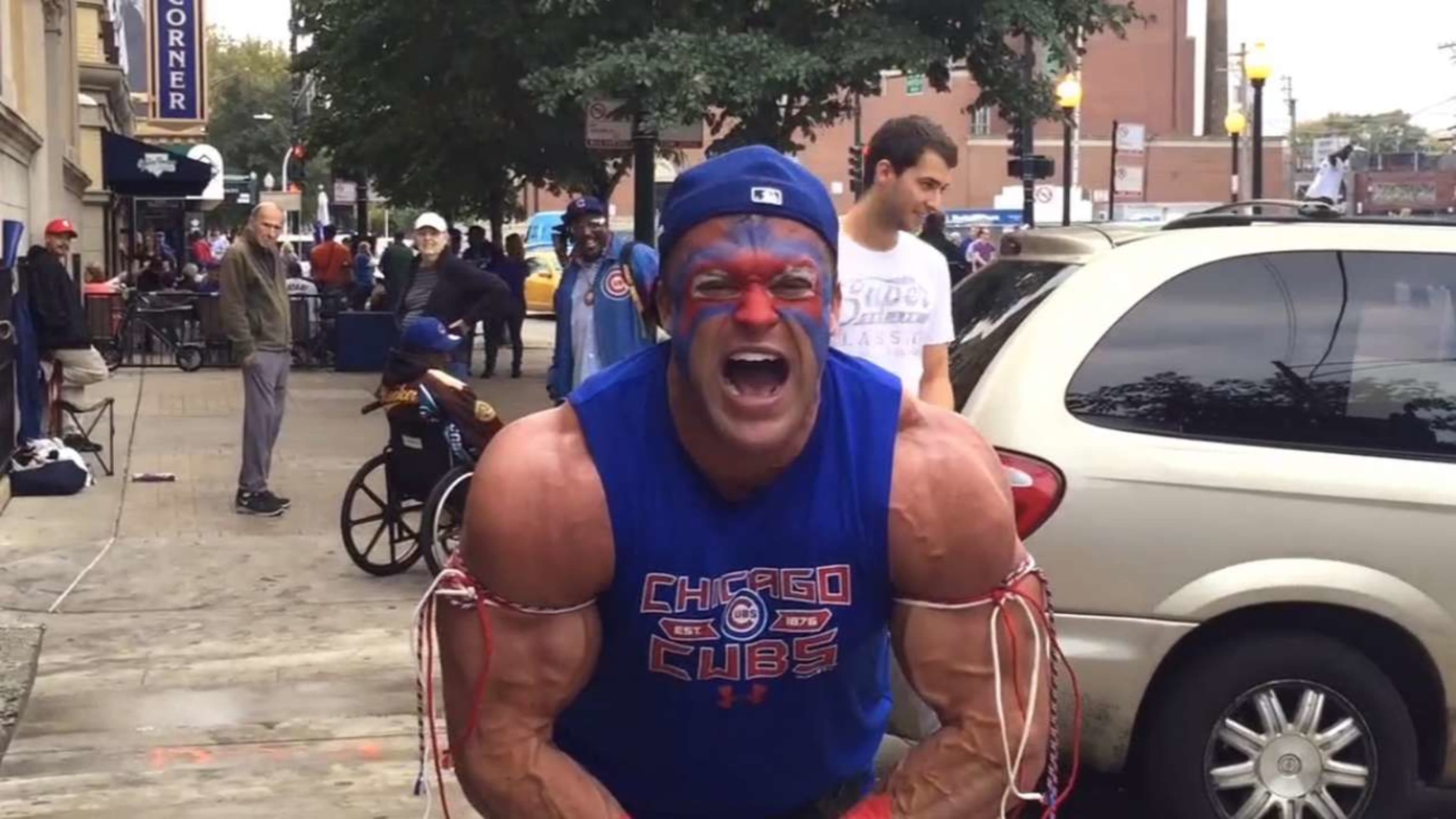 This bodybuilding fan would trade his enormous muscles for a Cubs