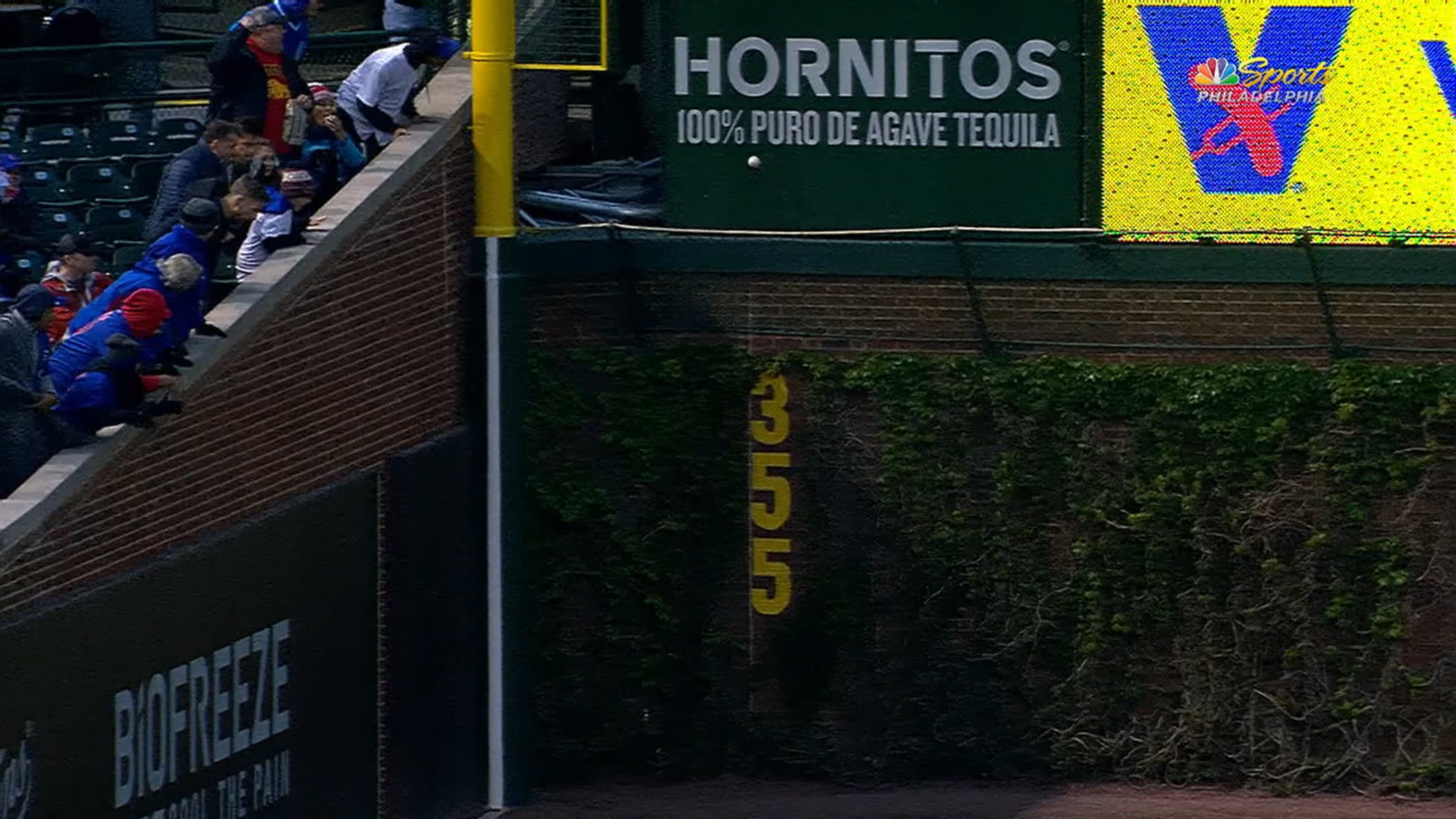 Chicago Cubs Javier Baez hits a ball flubbed by Washington