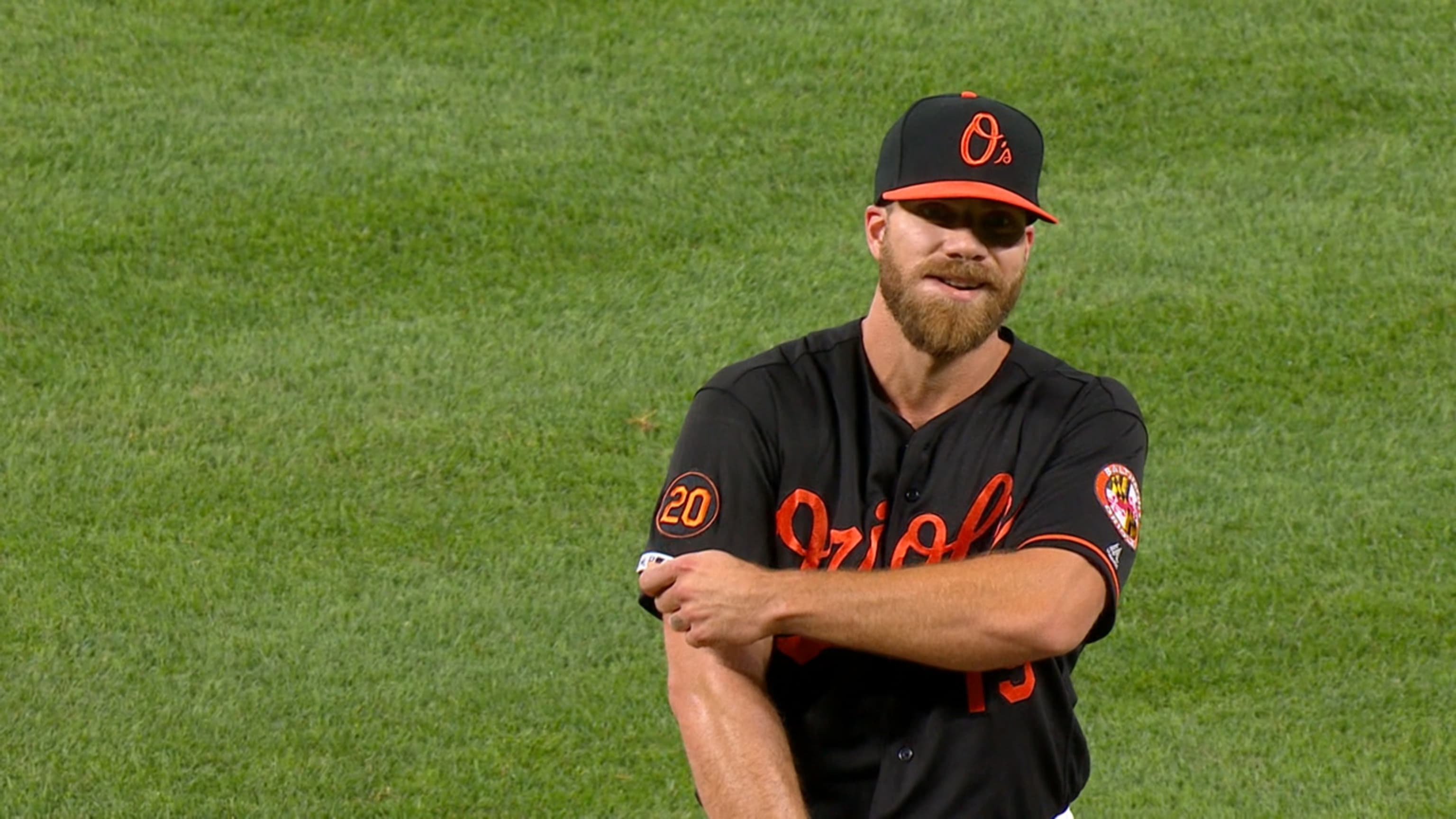 Chris Davis pitches, records a strikeout