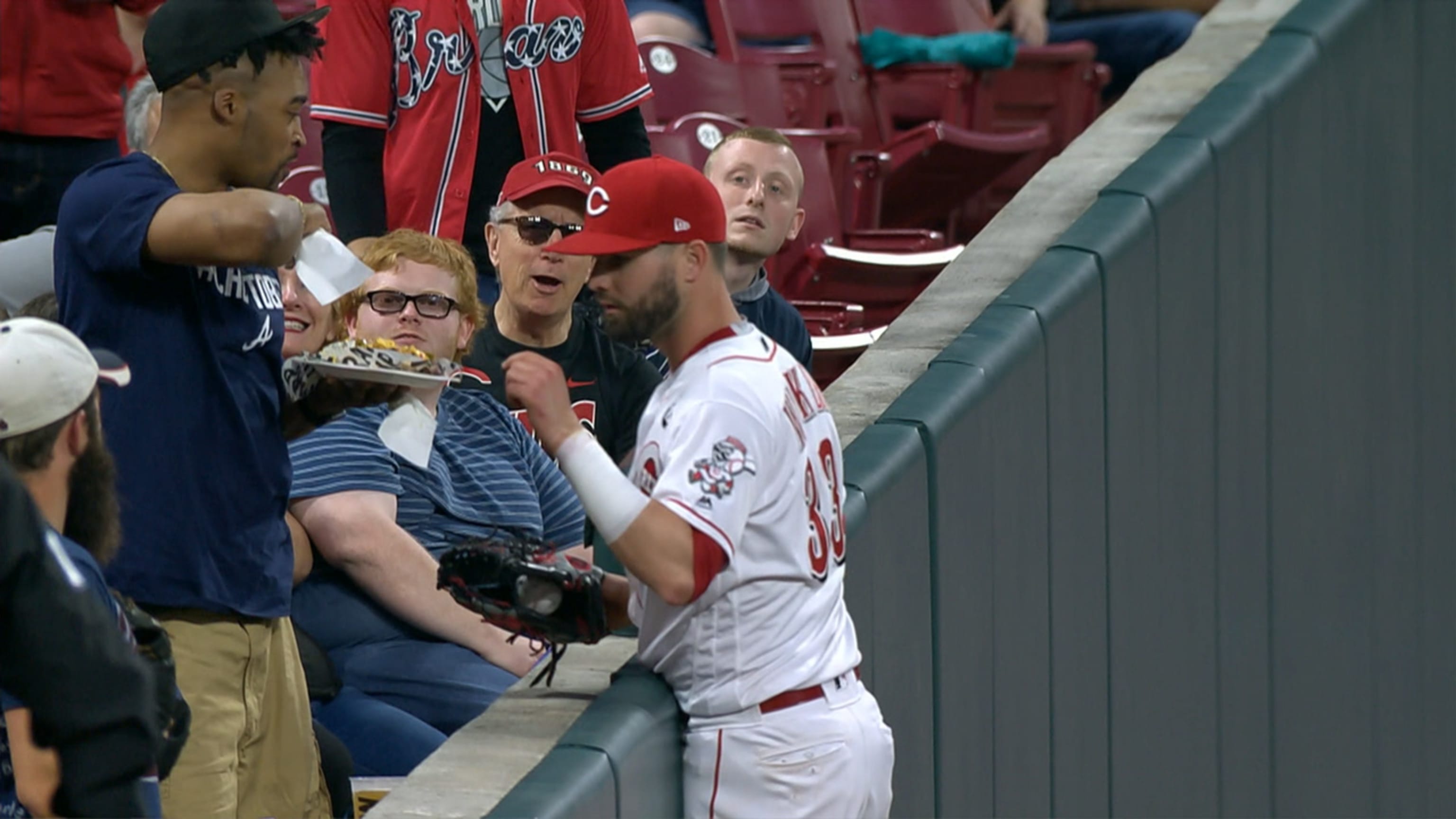 Winker nearly tries fan's nachos after catch | MLB.com