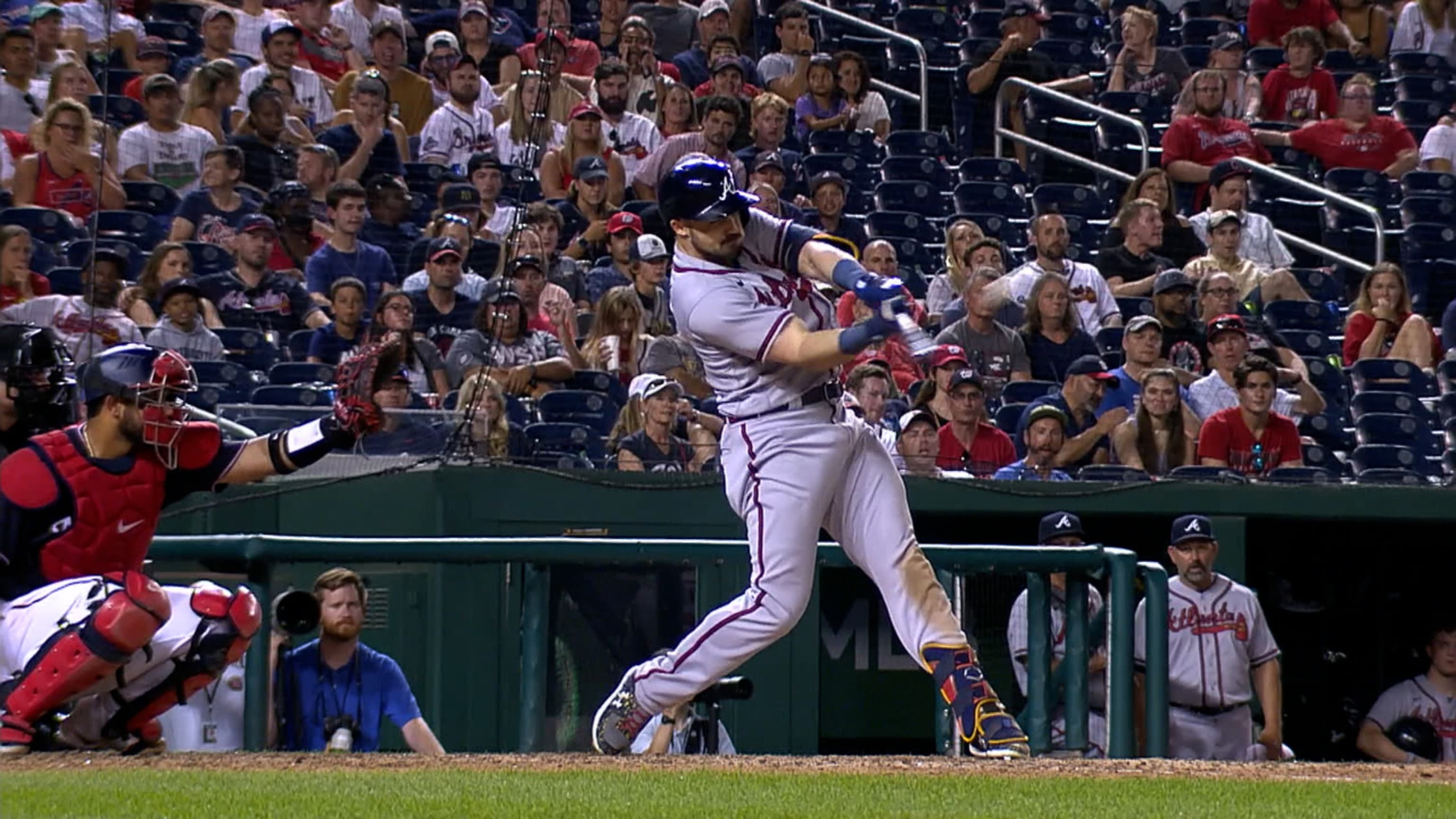 Adam Duvall of the Atlanta Braves looks on from the dugout during the