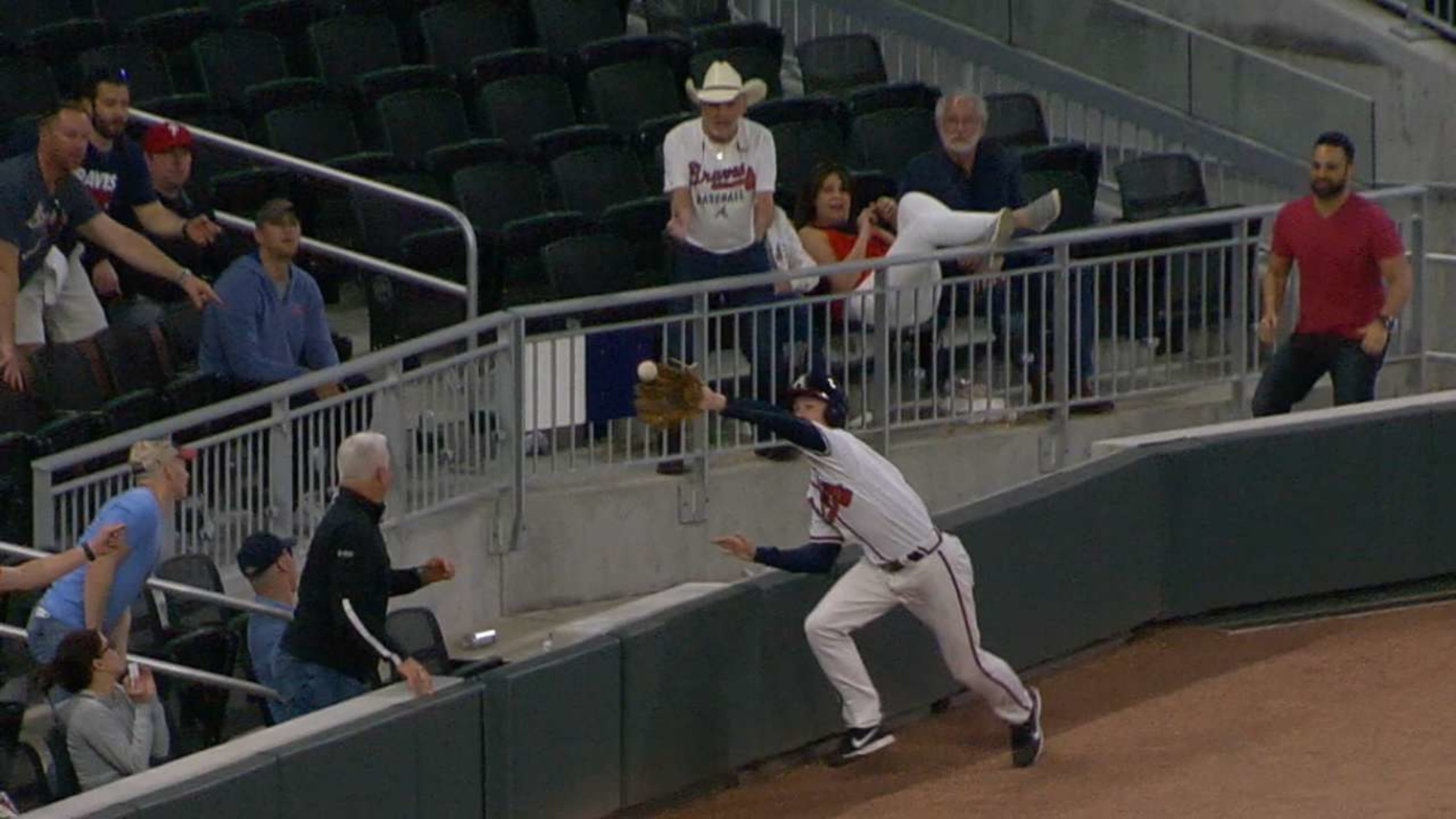 The Braves ballboy speared another line drive foul ball and