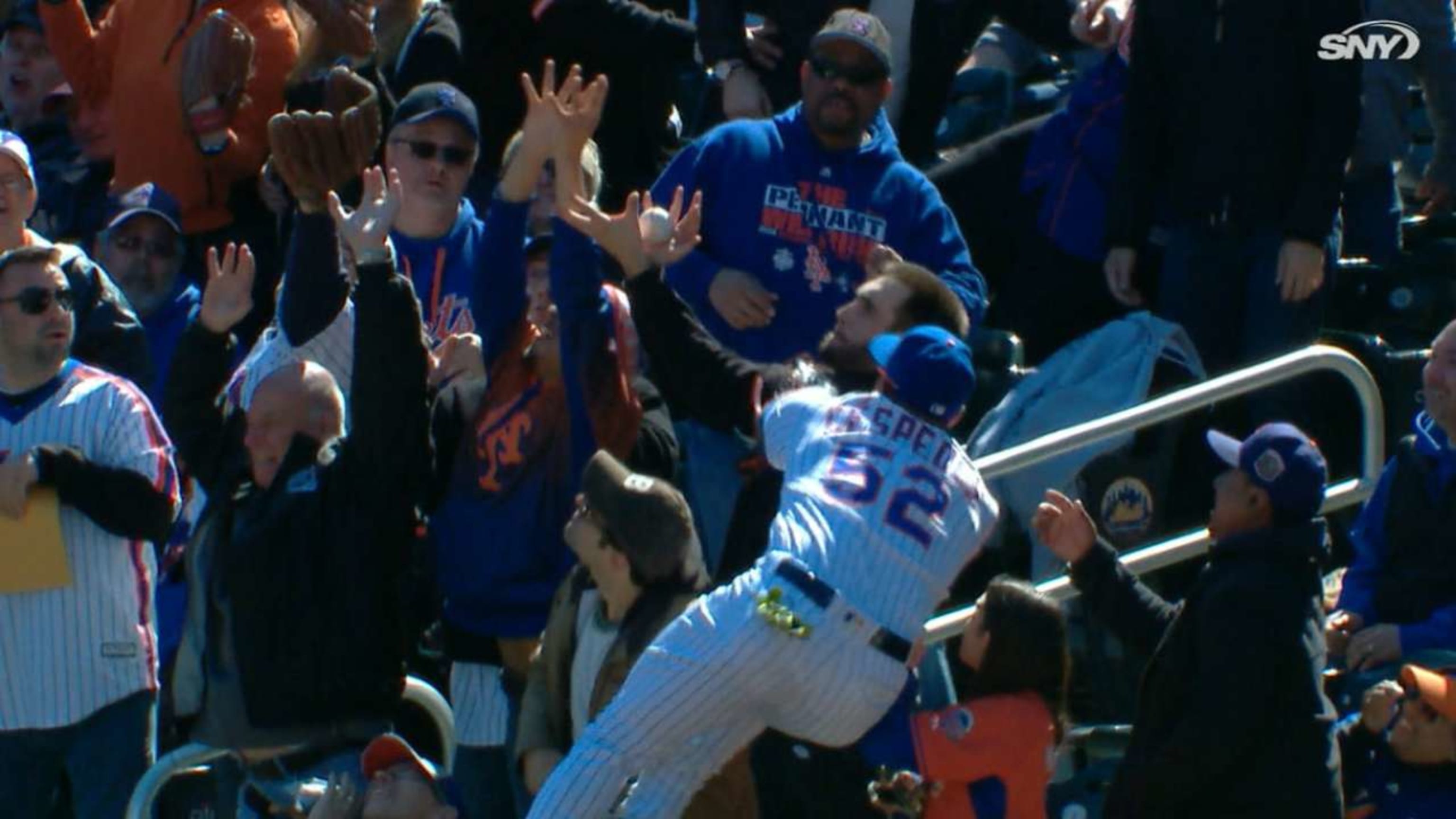 Yoenis Cespedes leaps into crowd for foul ball