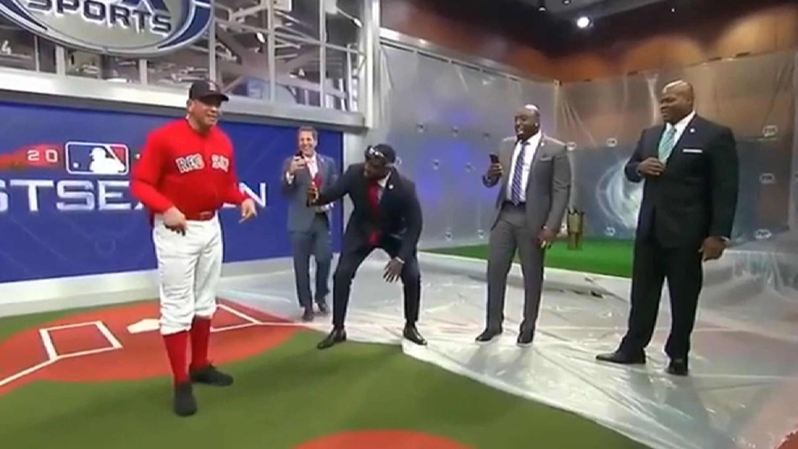 A-Rod wore a Red Sox jersey and got a champagne shower from David Ortiz  because a bet's a bet