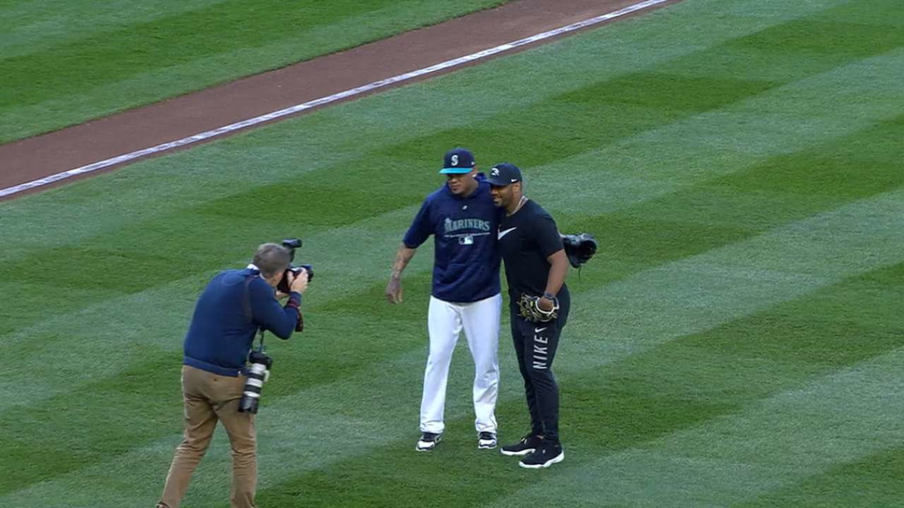 Yankees Minor Leaguer Russell Wilson threw out the ceremonial first pitch  at the Mariners game