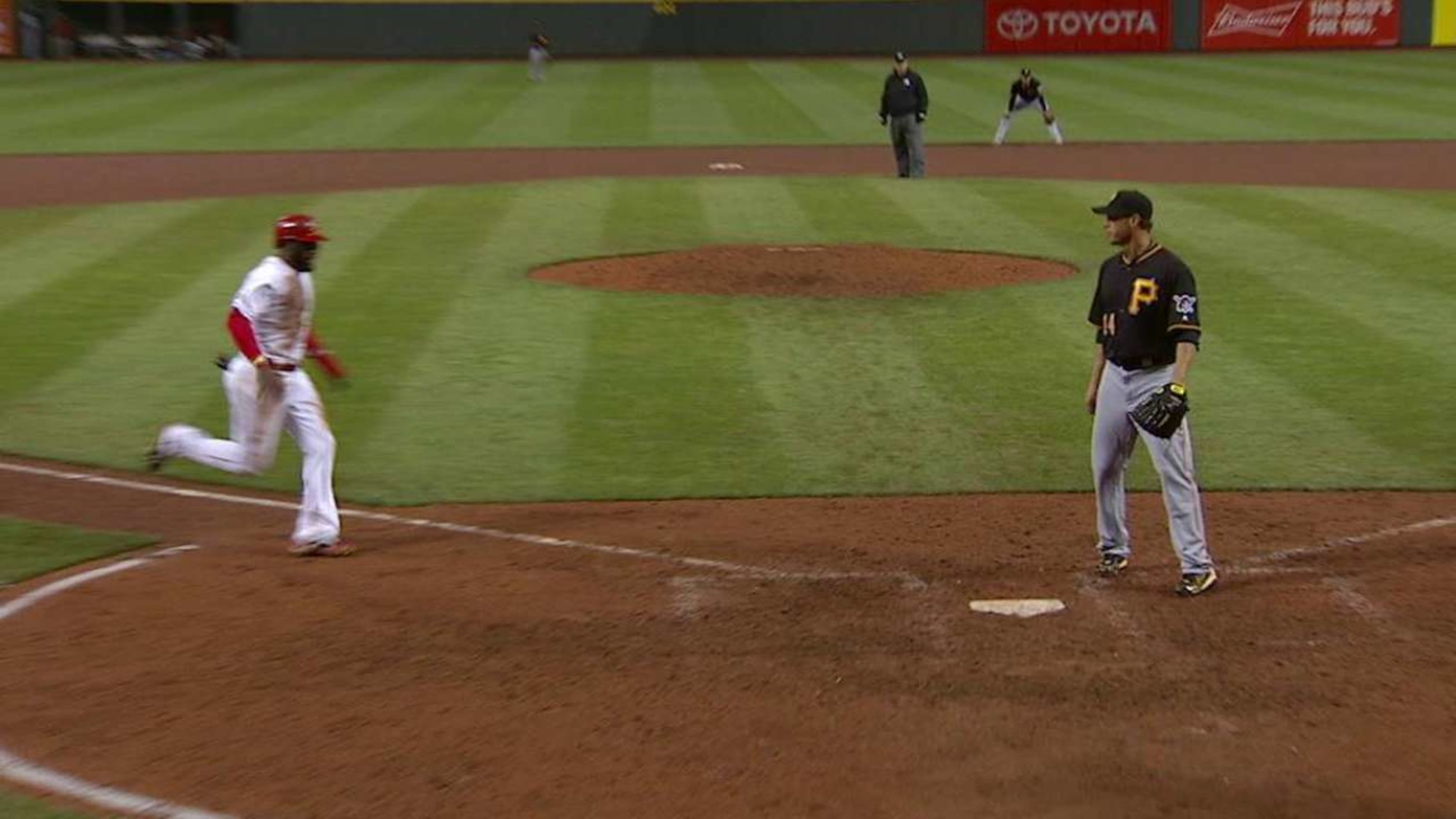 Phillips scores on a wild pitch
