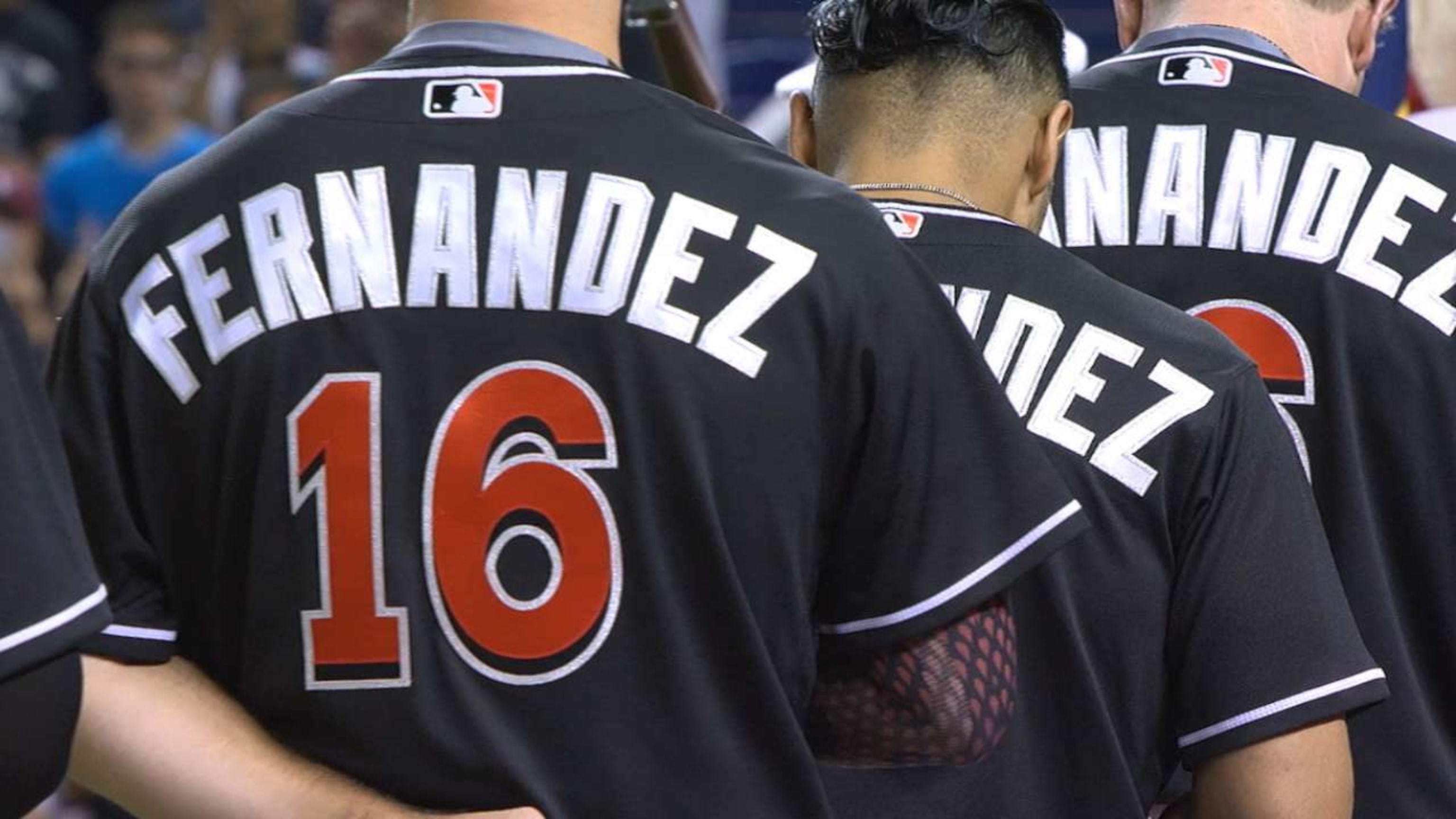 guy wearing marlins jersey at world series