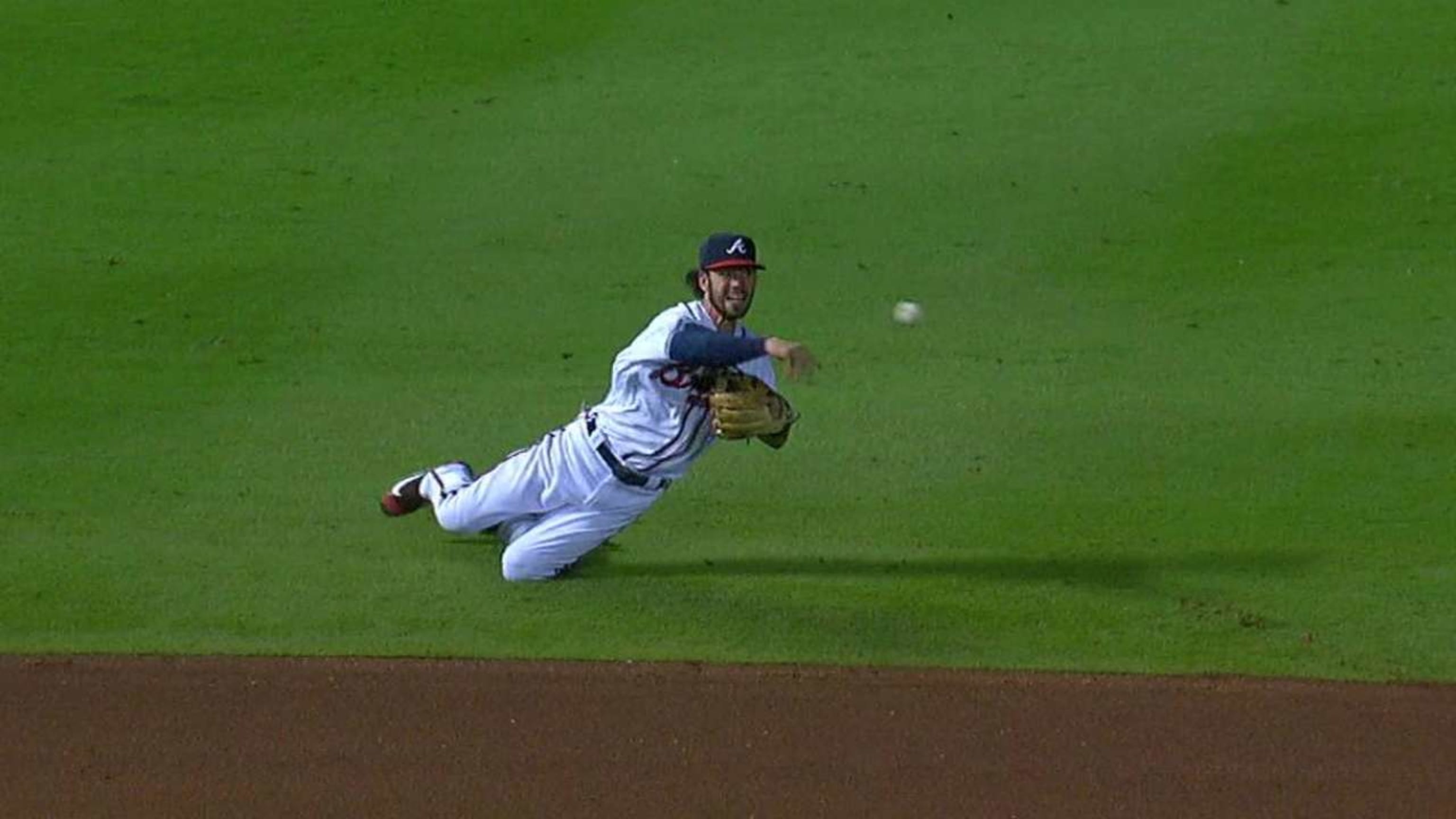 Atlanta Braves shortstop Dansby Swanson (7) throws the ball during