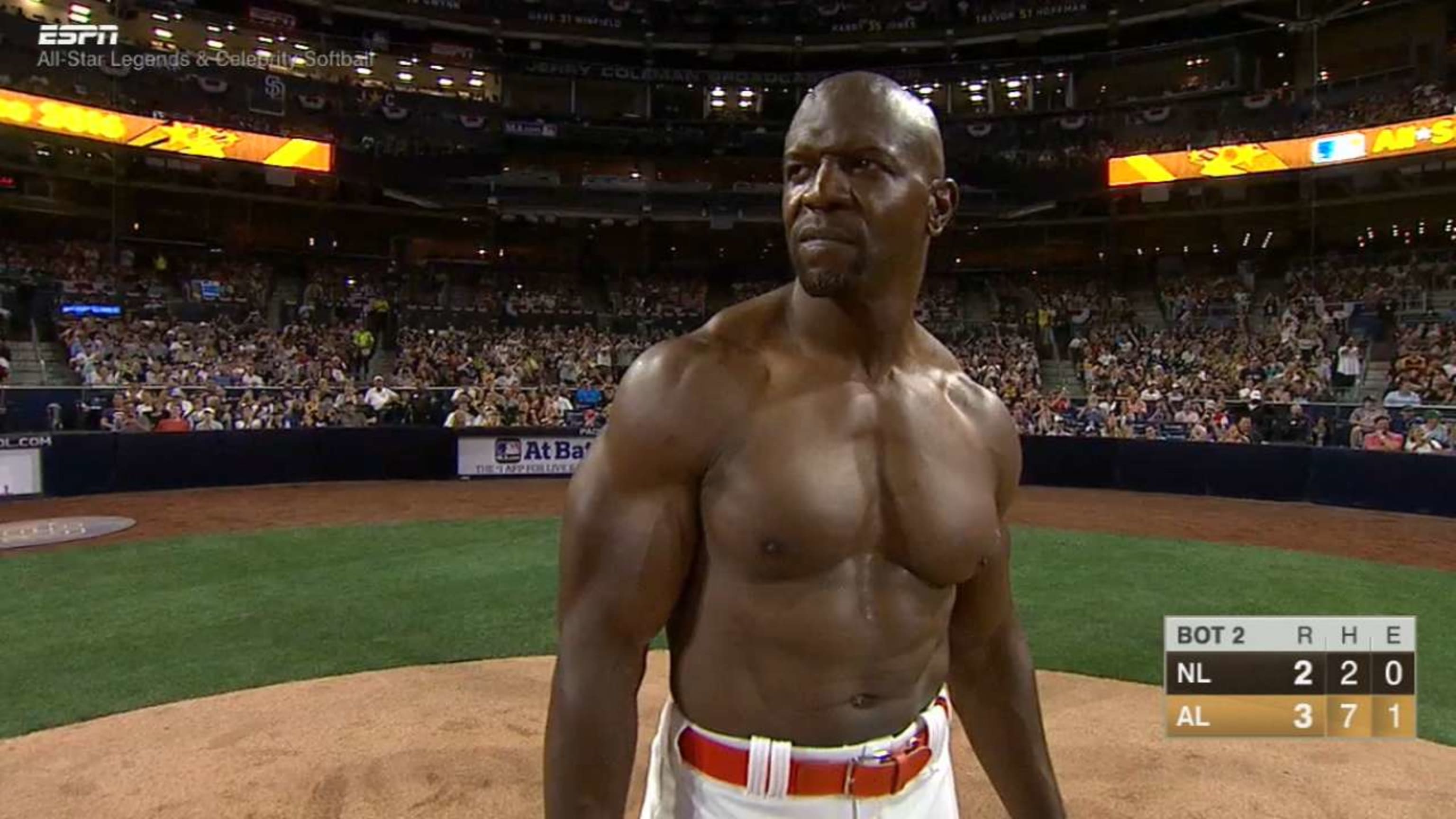Terry Crews flexed his bare chest during the Celebrity Softball