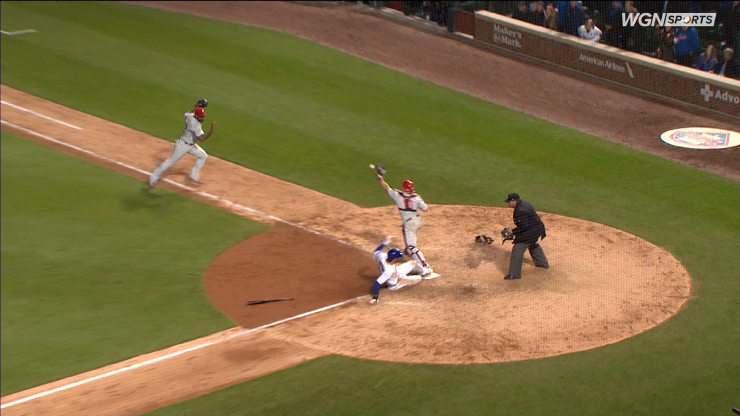 Chicago Cubs Javier Baez hits a ball flubbed by Washington