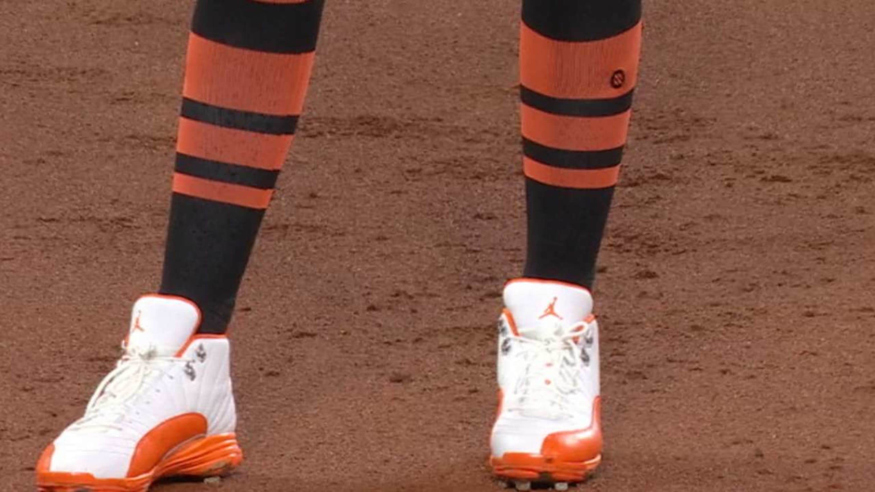 Orange jordan cleats top