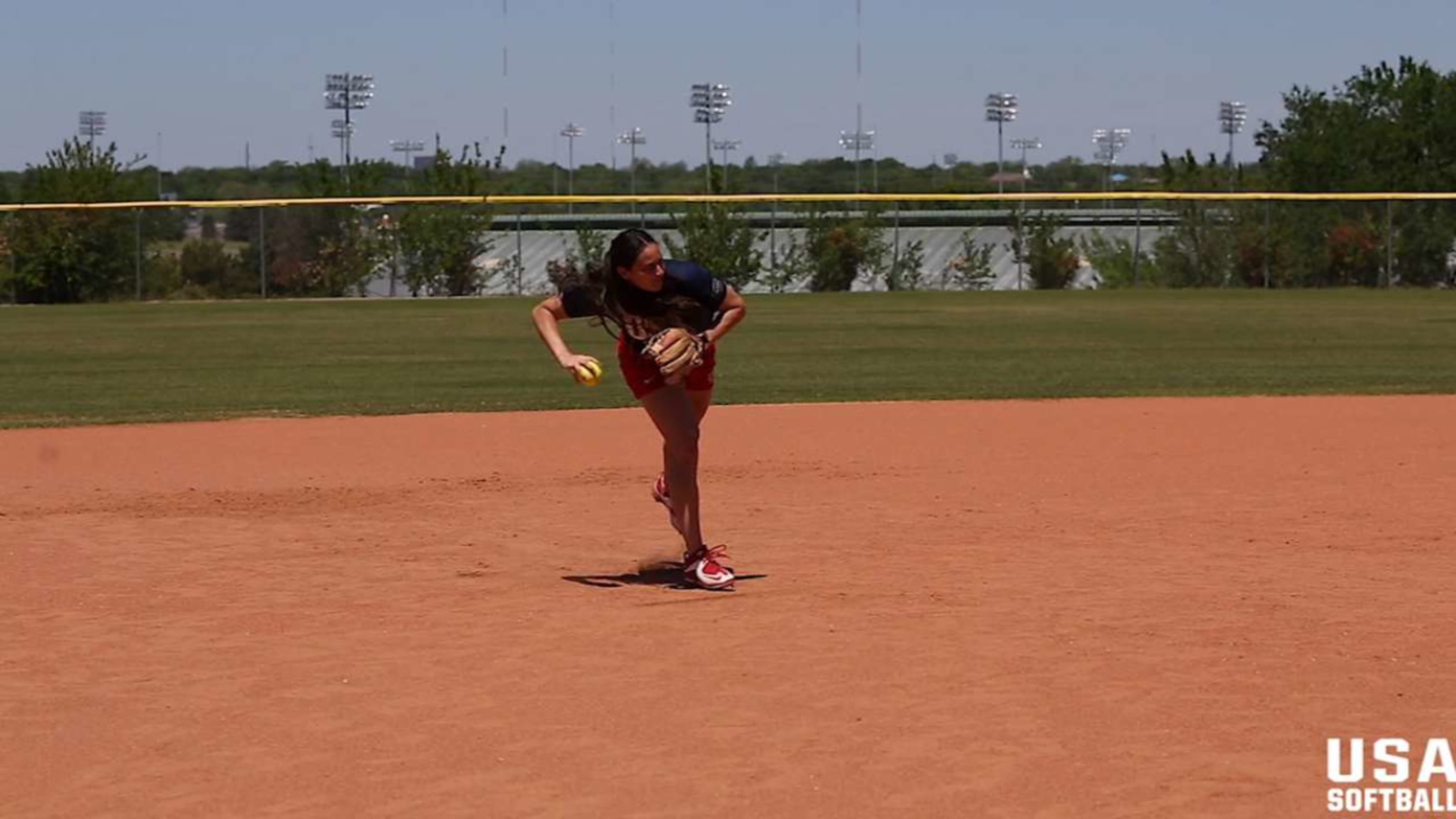 USA Softball throwing on run