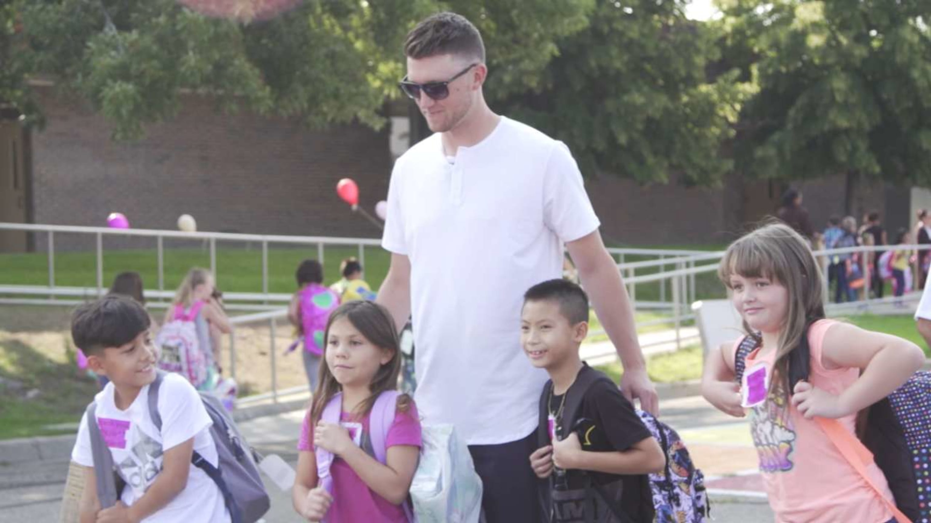 Kyle Freeland Helps Distribute School Supplies
