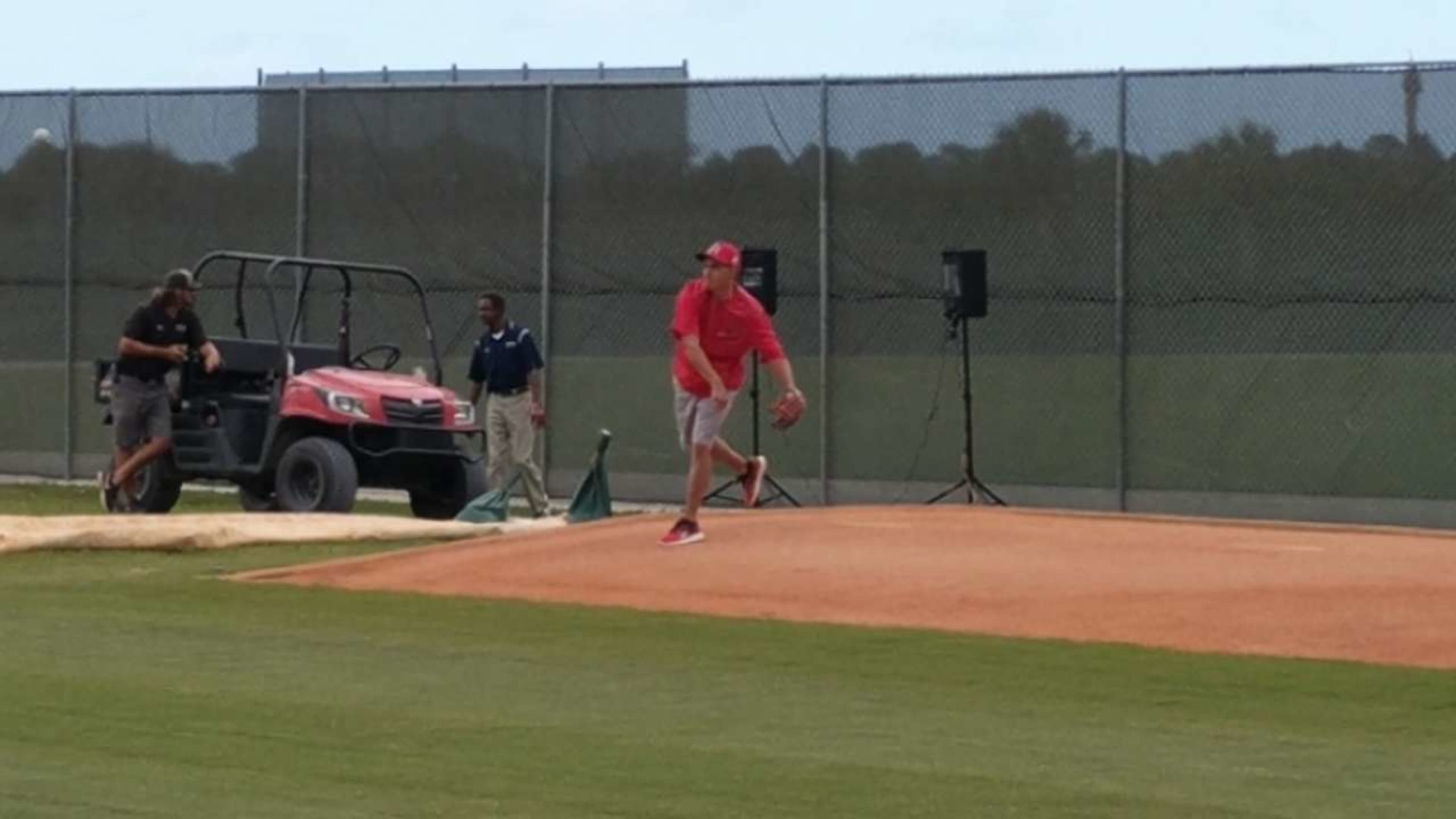 Rickie Fowler rolled up to Cardinals camp in his Ferrari to throw