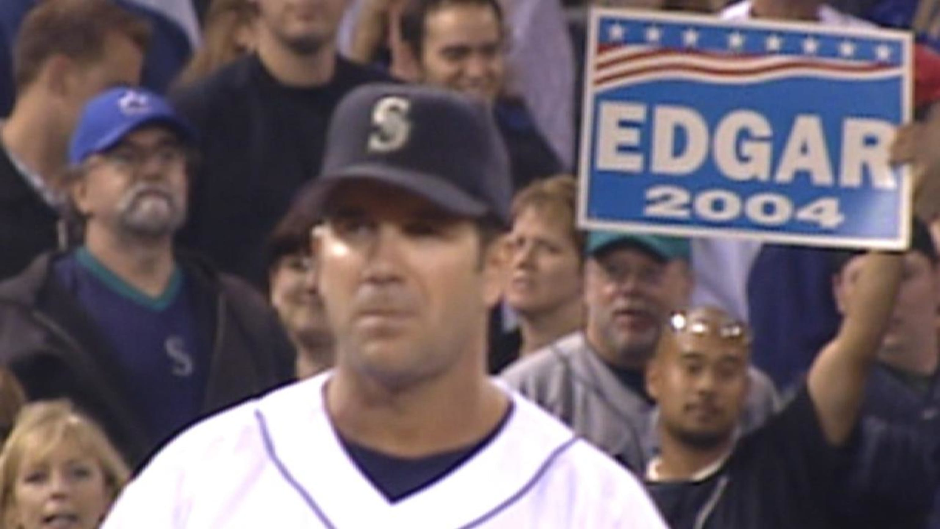 FILE - In this April 1, 2002, file photo, Seattle Mariners' Edgar Martinez  tips his cap to the crowd as he is introduced for the baseball team's  season opener against the Chicago