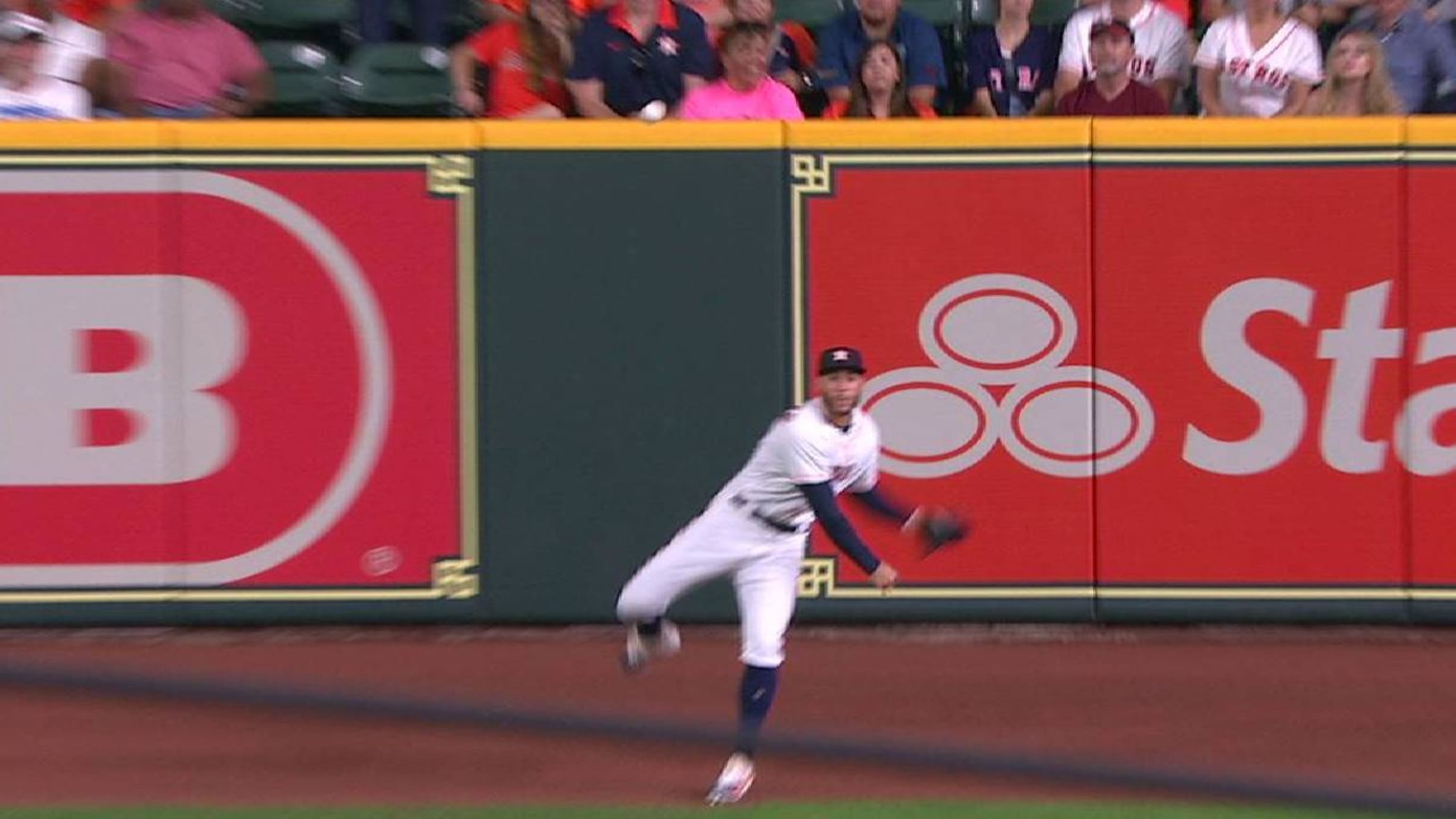 George Springer of the Houston Astros steals second base in the ninth