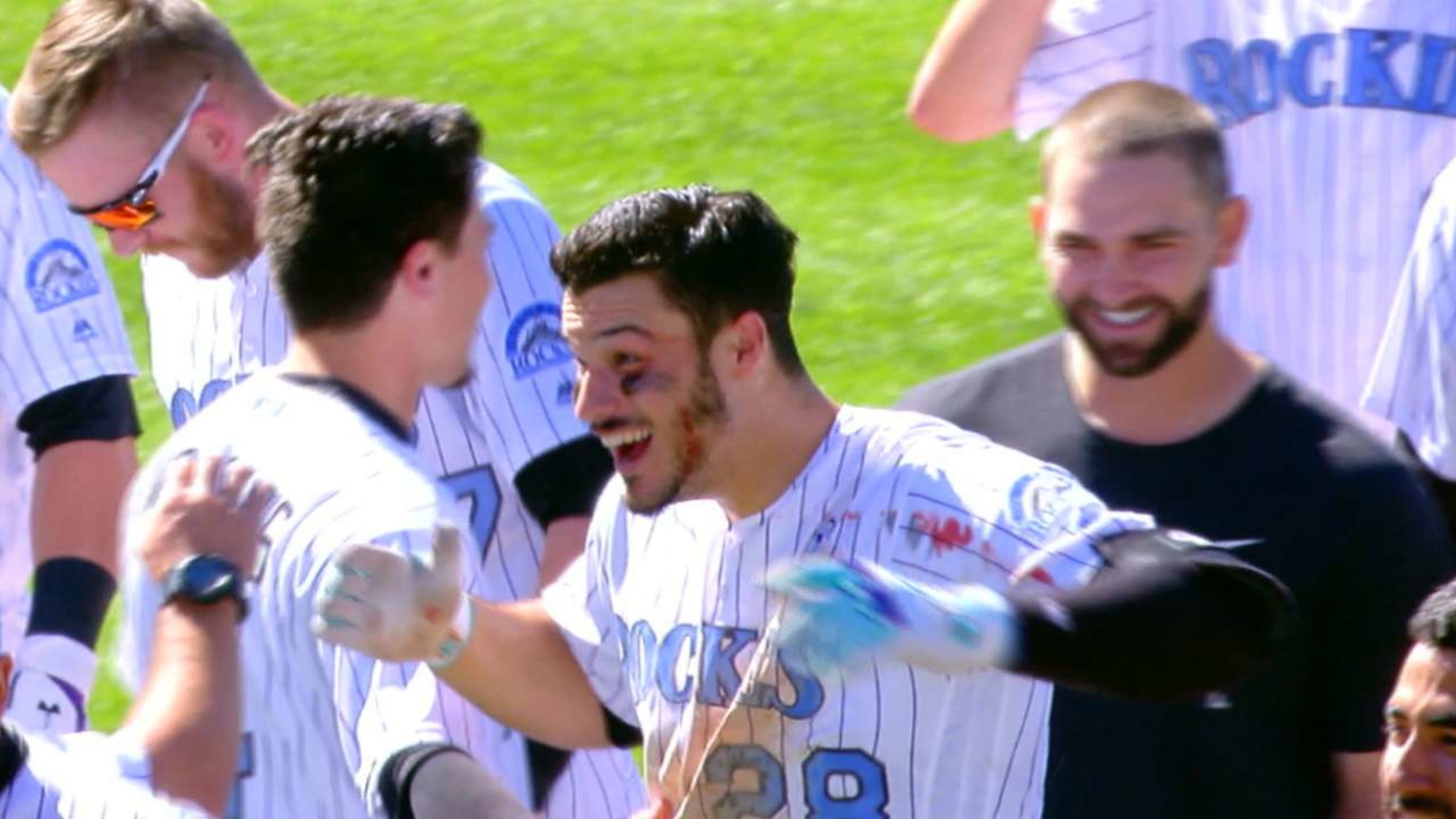 The Rockies basically beat up Nolan Arenado in a bloody walk-off cycle  celebration