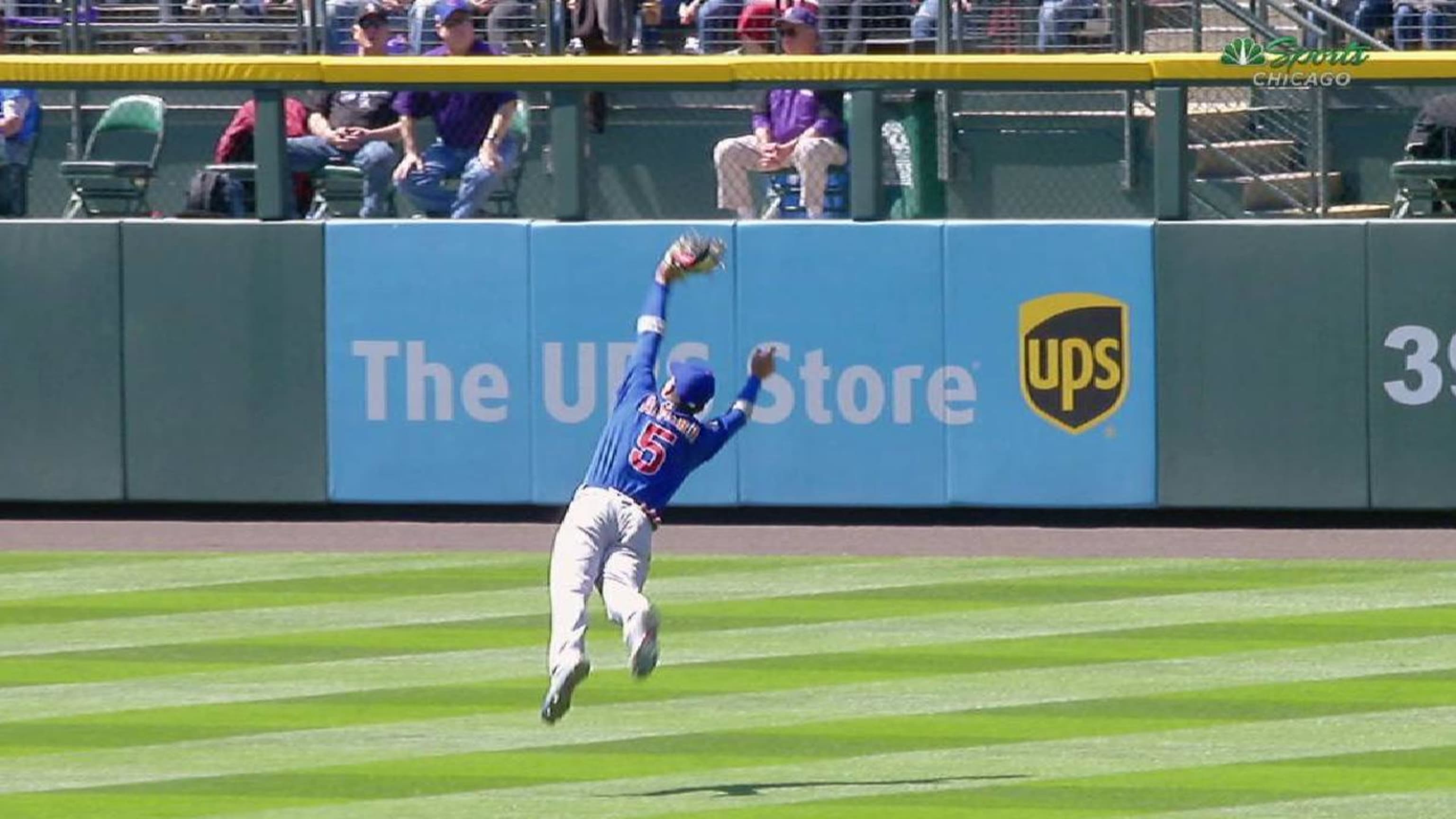 Chicago Cubs' Albert Almora Jr., right, reacts after hitting a