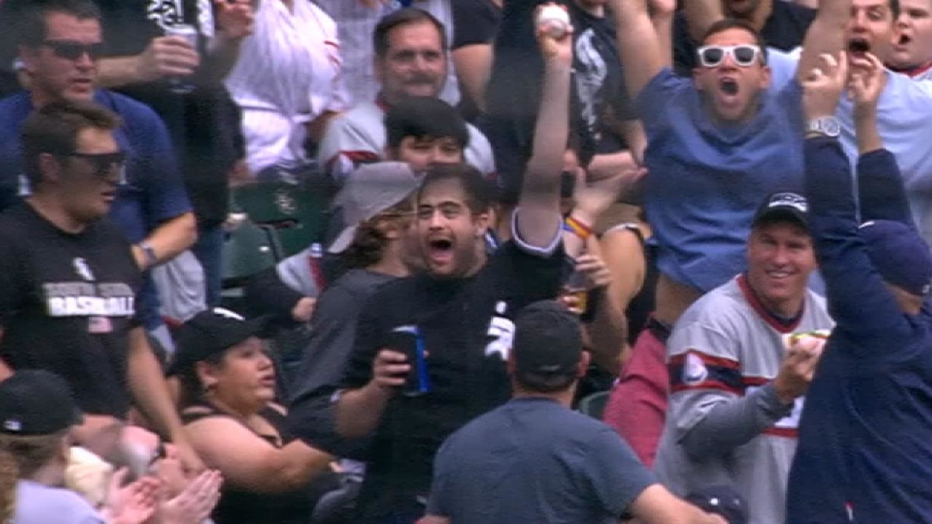 Thoroughly embracing the moment, this White Sox fan barehanded a