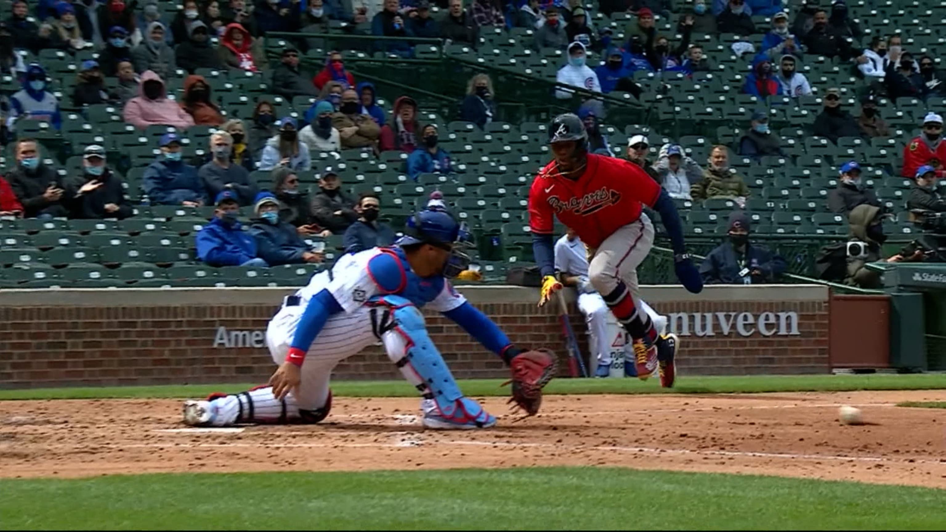 Atlanta Braves' Ronald Acuna Jr. scores on a double by Marcell