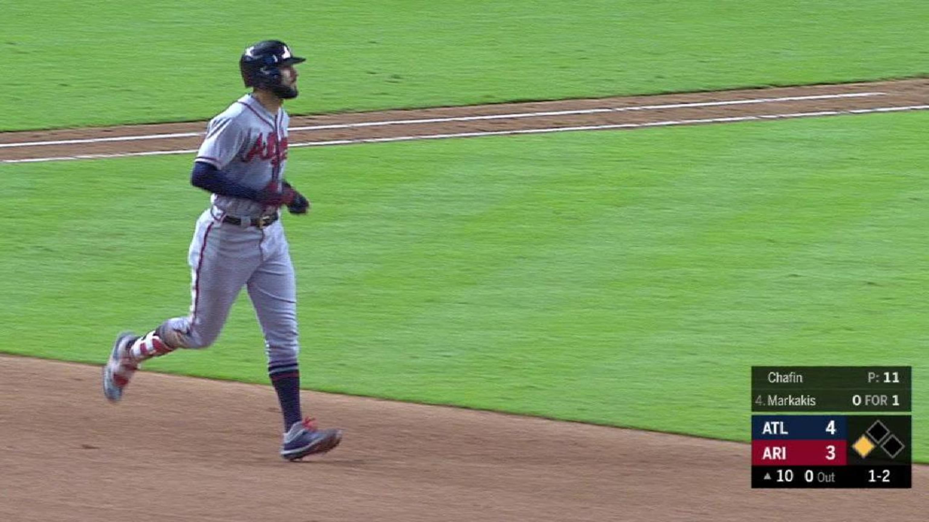 Freeman scores on throwing error