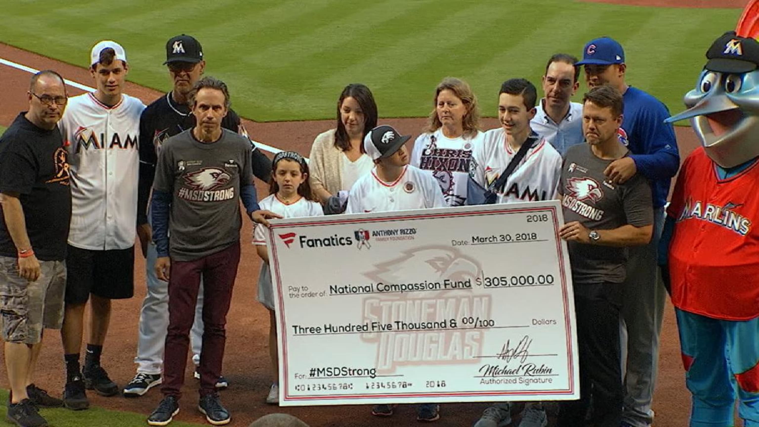 Stoneman Douglas families throw out first pitch at Cubs-Marlins game