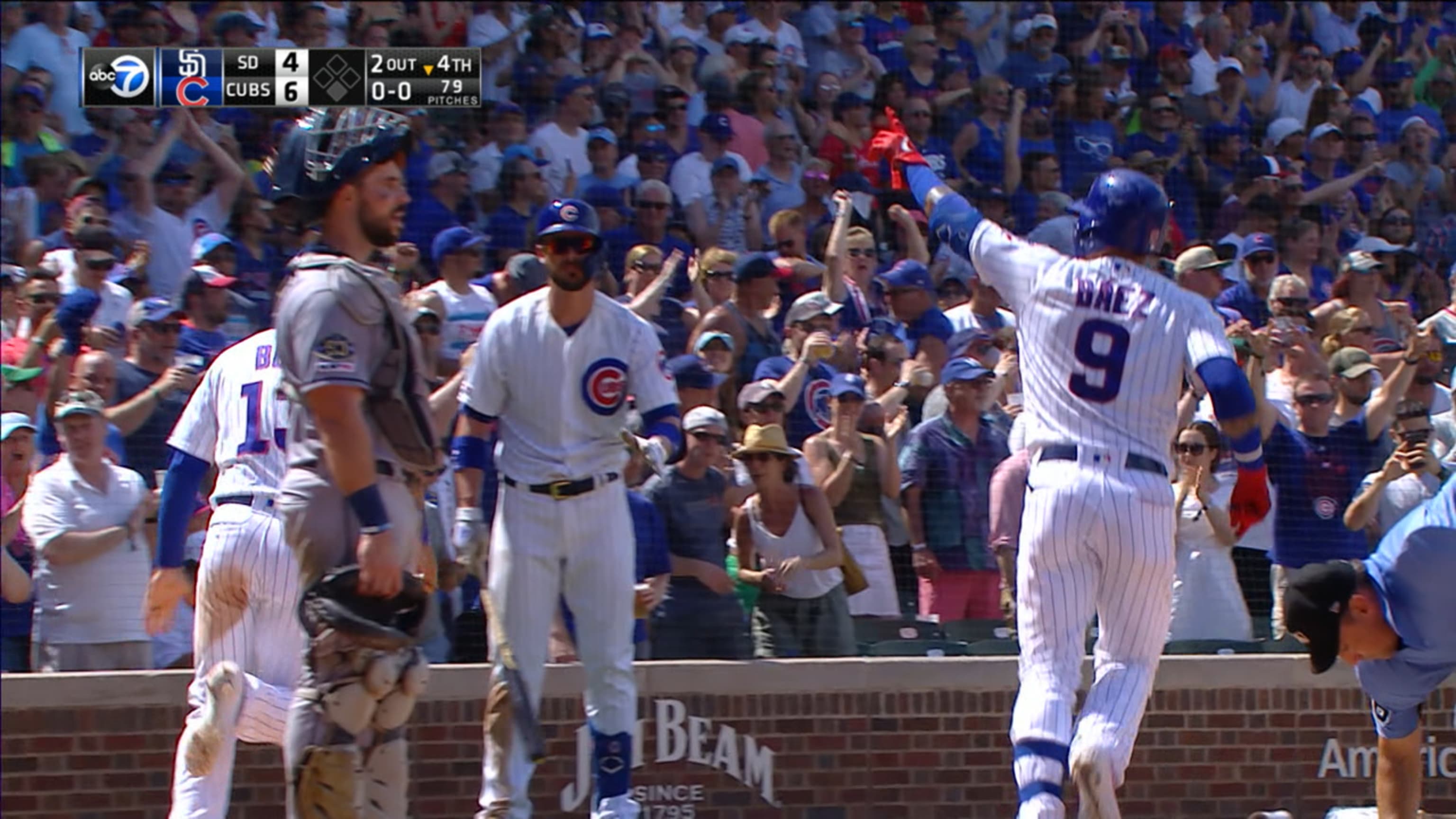 Chicago Cub Javier Baez is all smiles making no-look tag for