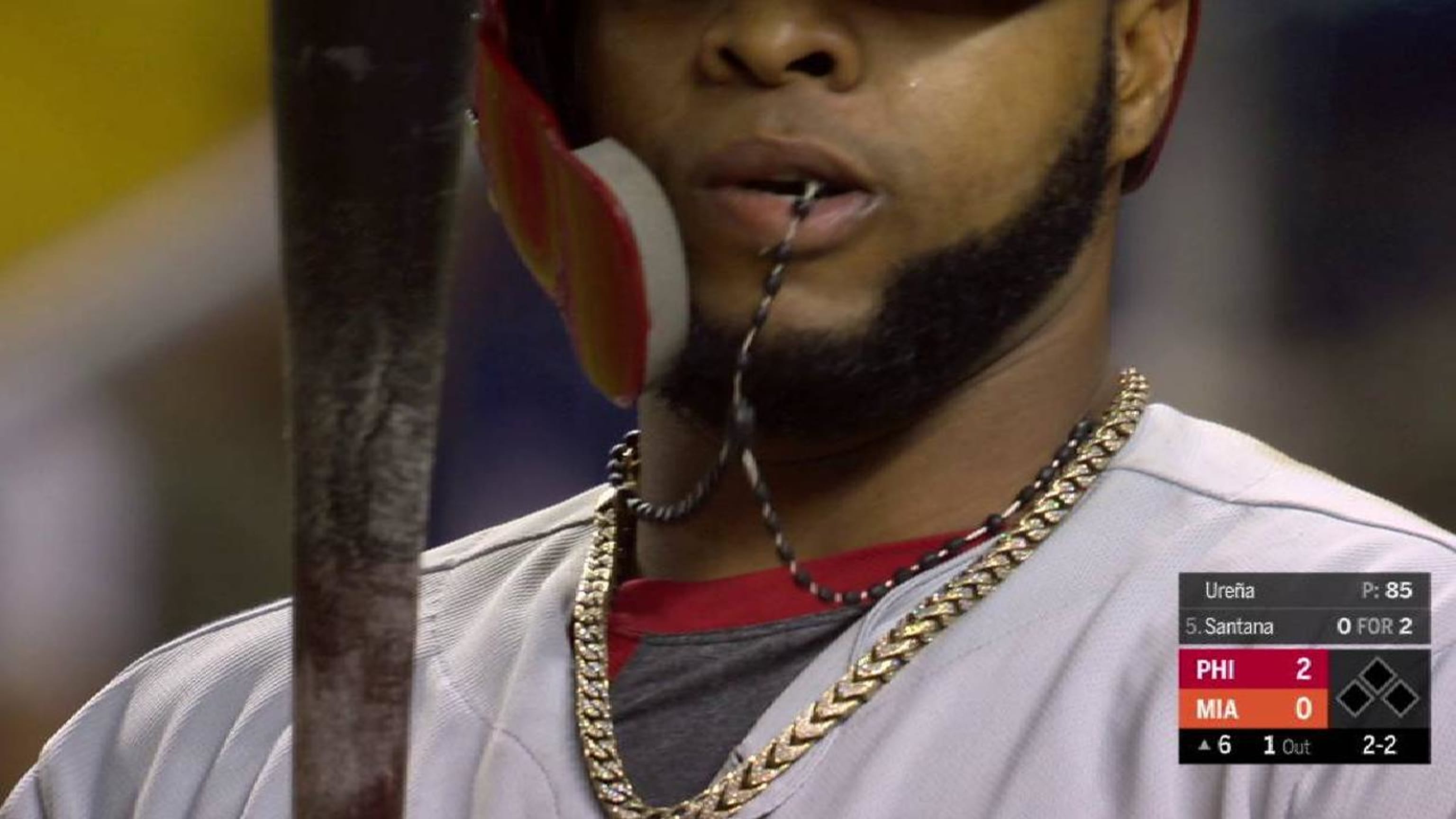 Carlos Santana spent an entire at bat with his necklace in his