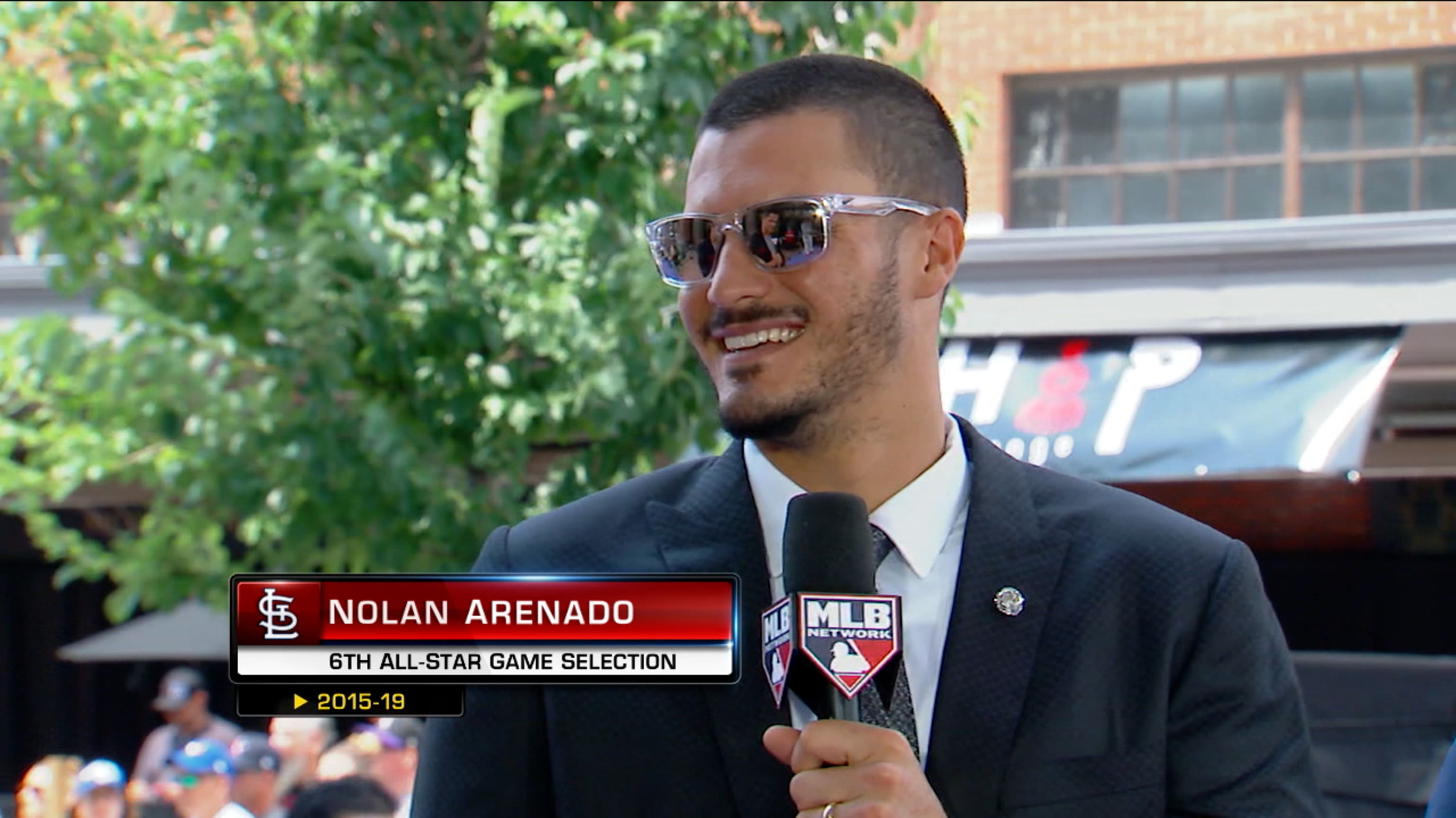 Nolan Arenado stars as a Cardinal at Coors Field