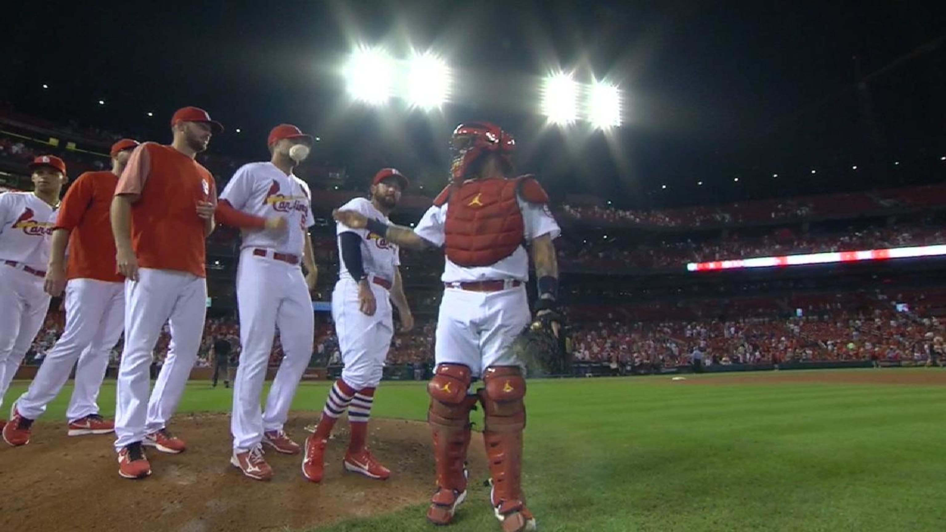 Yadier Molina threw a rosin bag in Adam Wainwright's face and gleefully  pointed to the camera