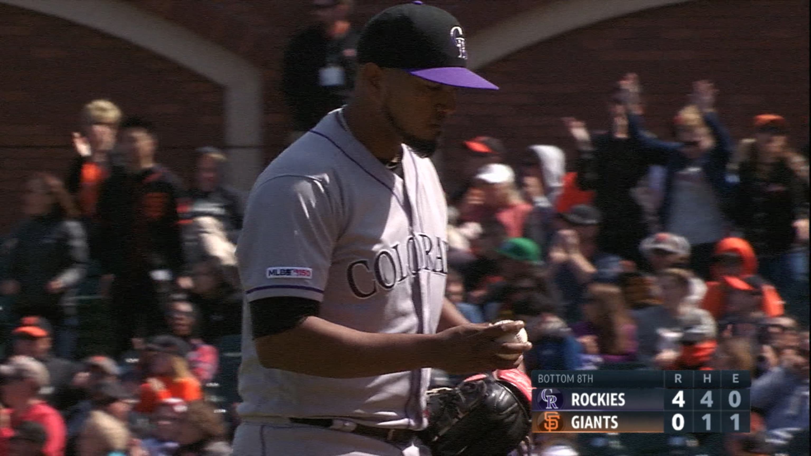 Nolan Arenado of the Colorado Rockies field sth eball for an out