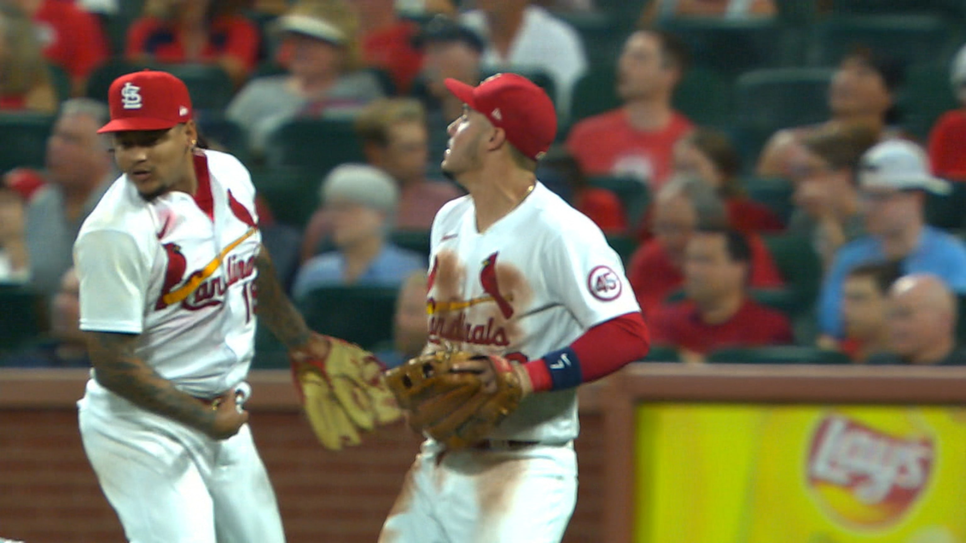 St. Louis Cardinals Vince Coleman, center, lies on the field of