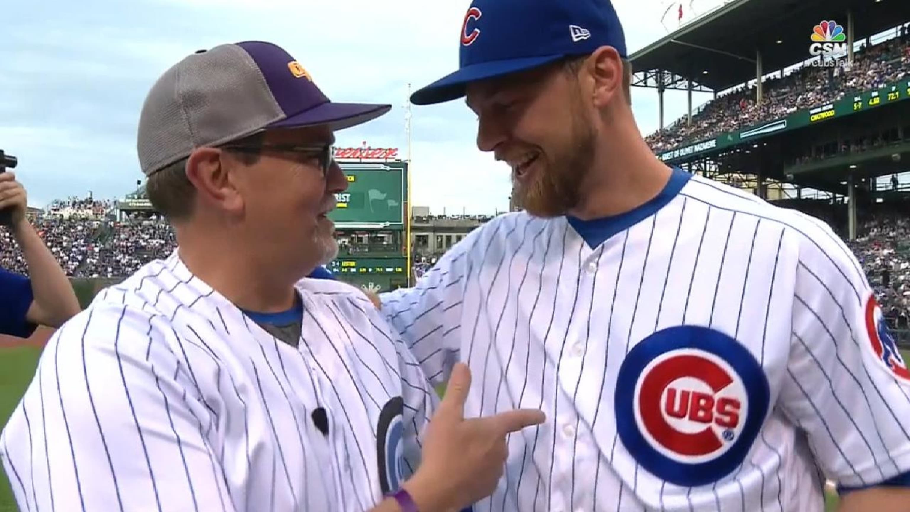 Ben Zobrist was surprised on his own bobblehead night by his father, who  threw the first pitch to him
