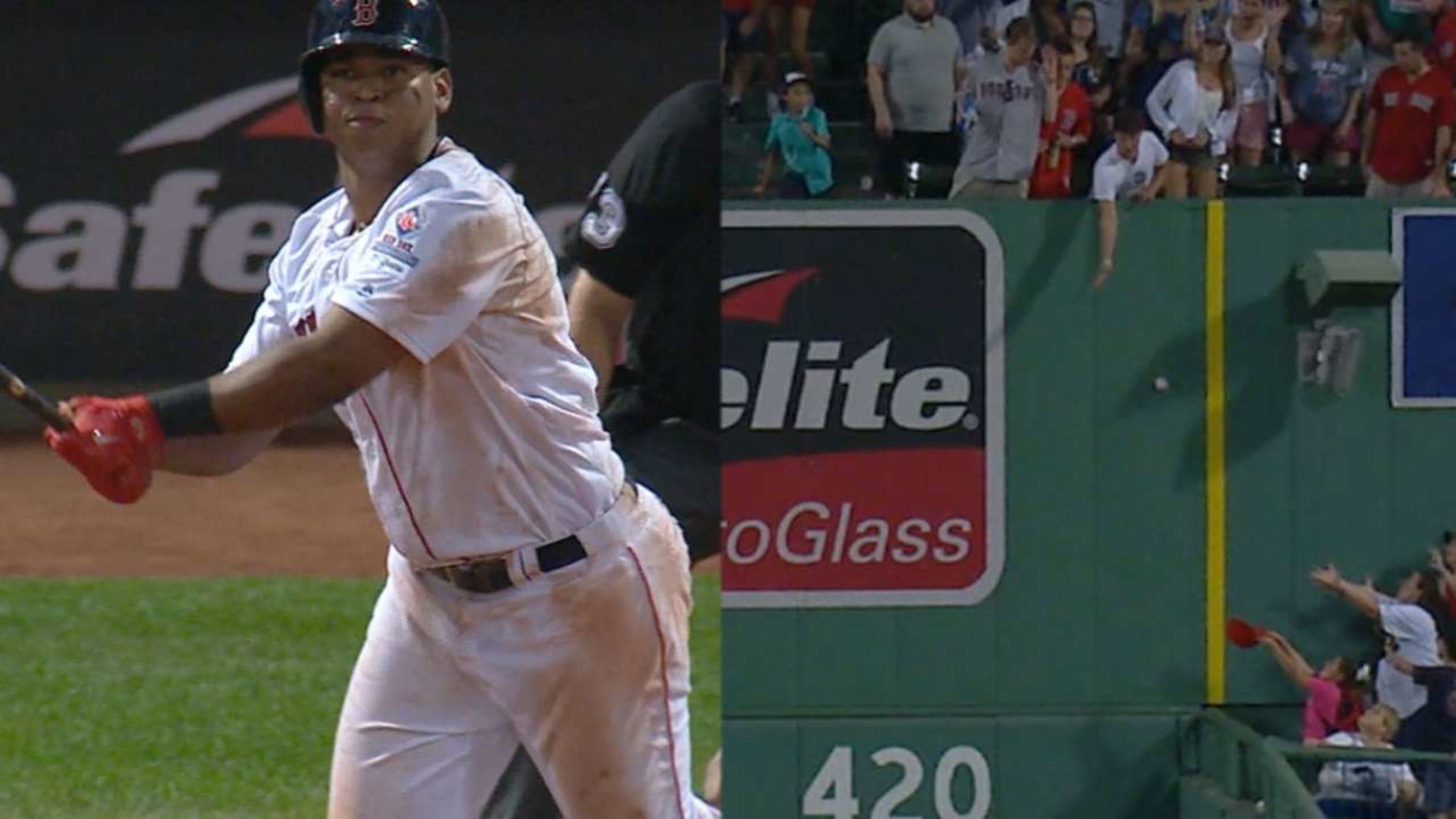 Baby-faced Rafael Devers with a very 90's-amount of chew in his