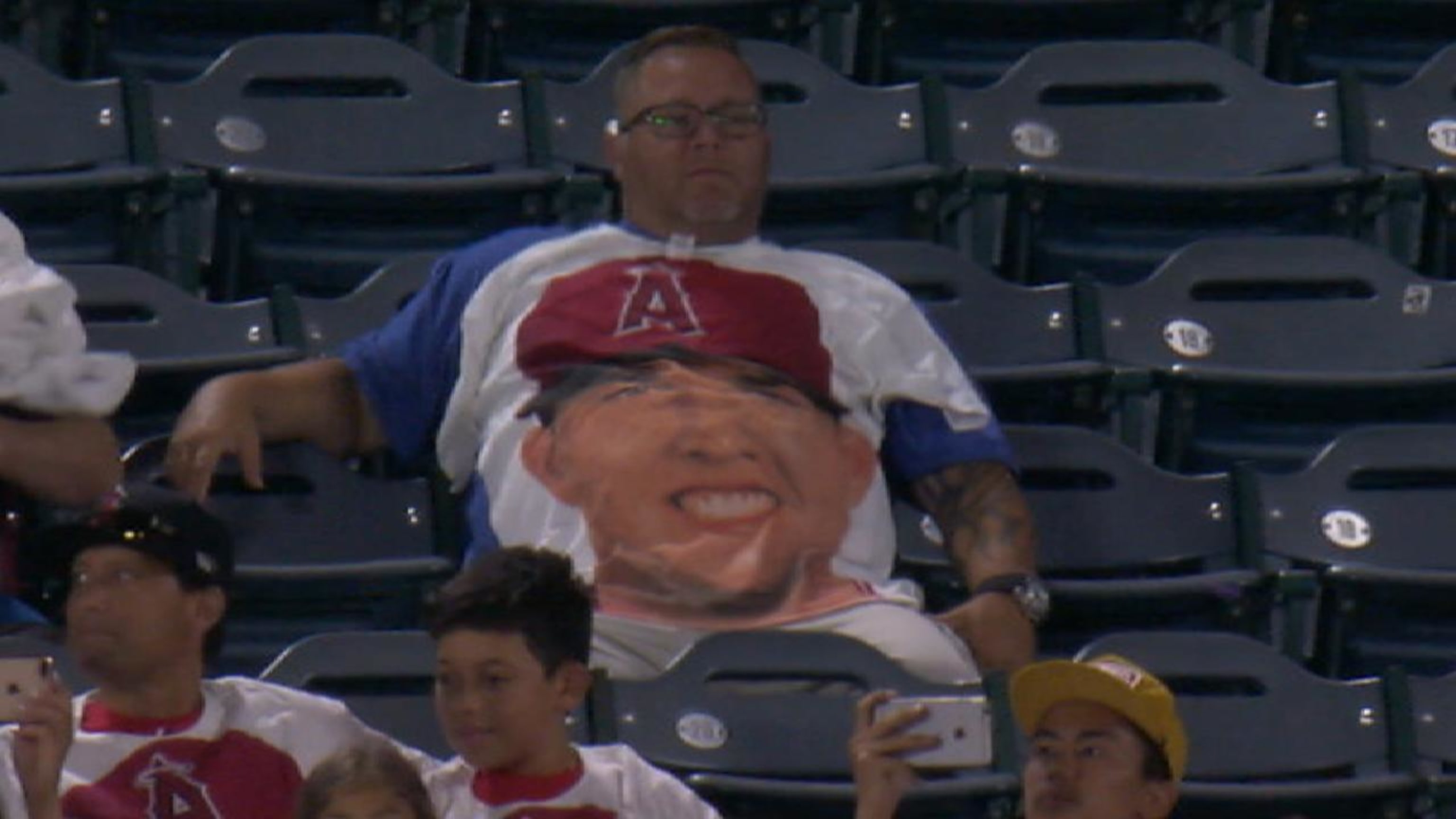 Angels fans hypnotized the camera with Mike Trout's face everywhere thanks  to Trout Shirt Night