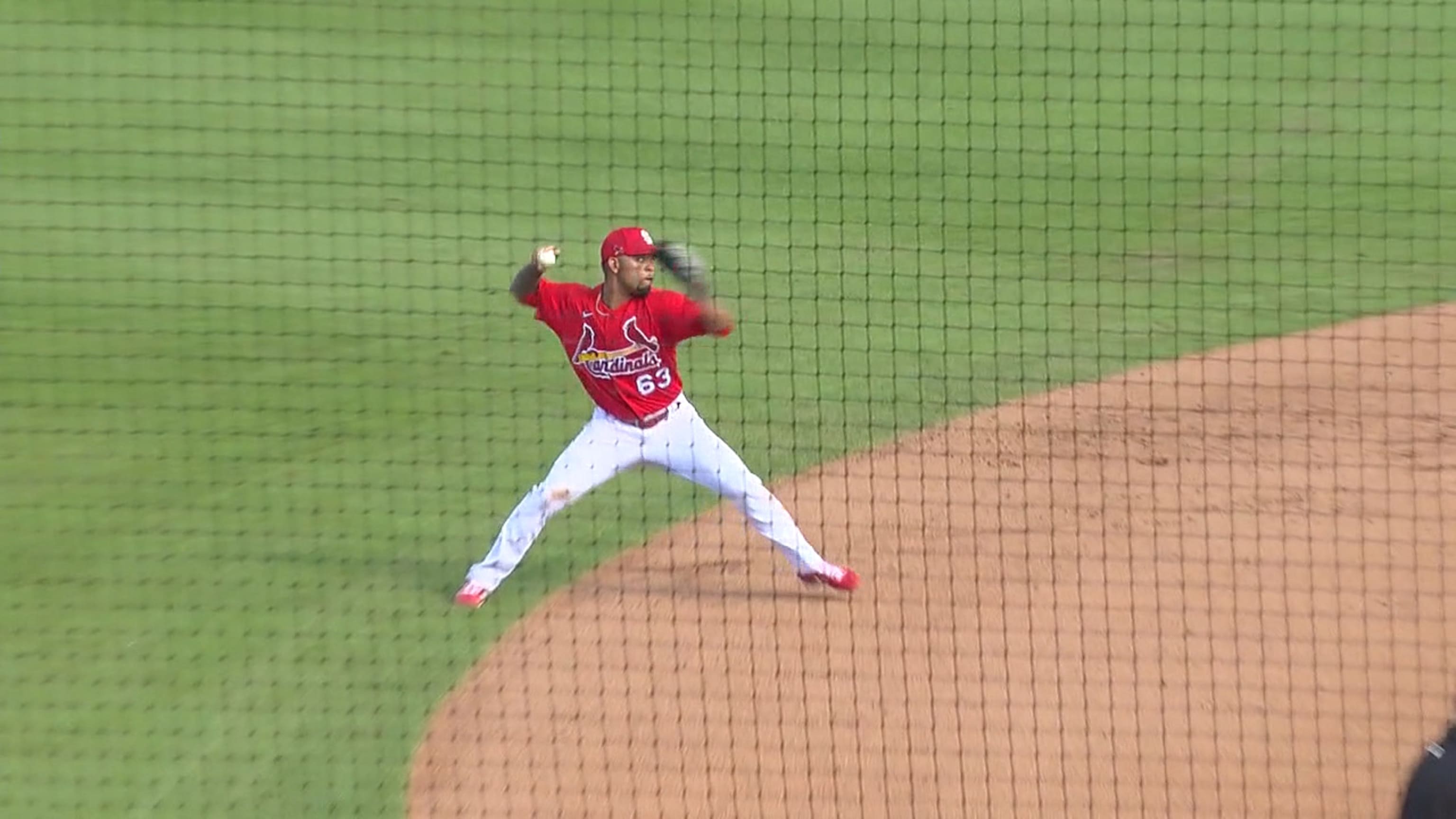 The St. Louis Cardinals' Edmundo Sosa rounds second base as he