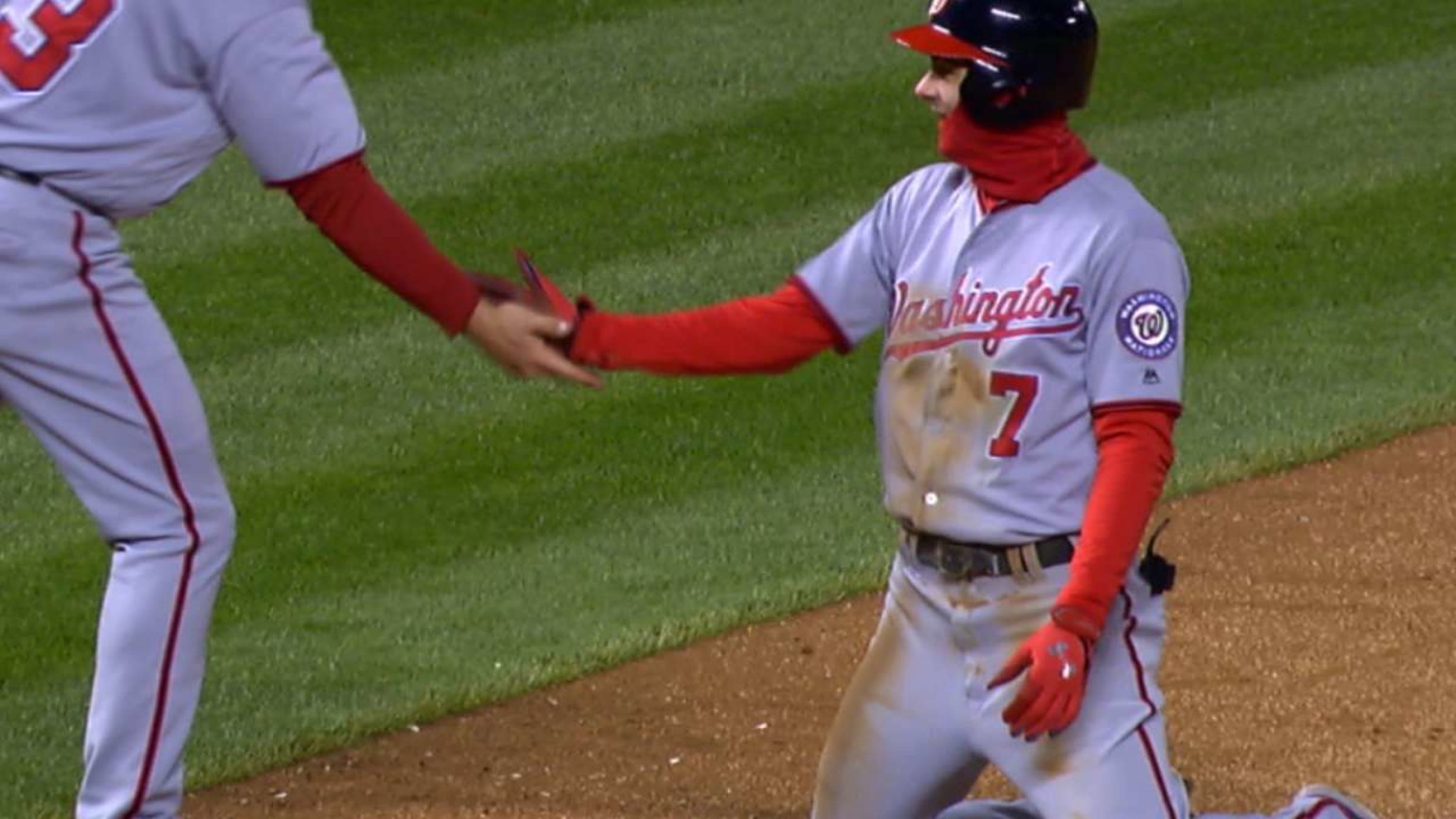 North Carolina State third baseman Trea Turner, left, collides