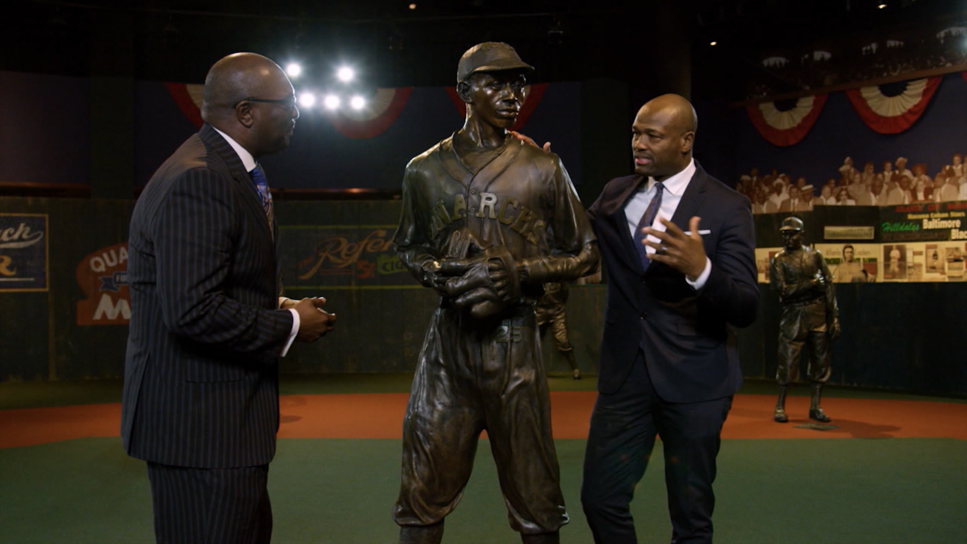 Former Negro League and current National League players stand