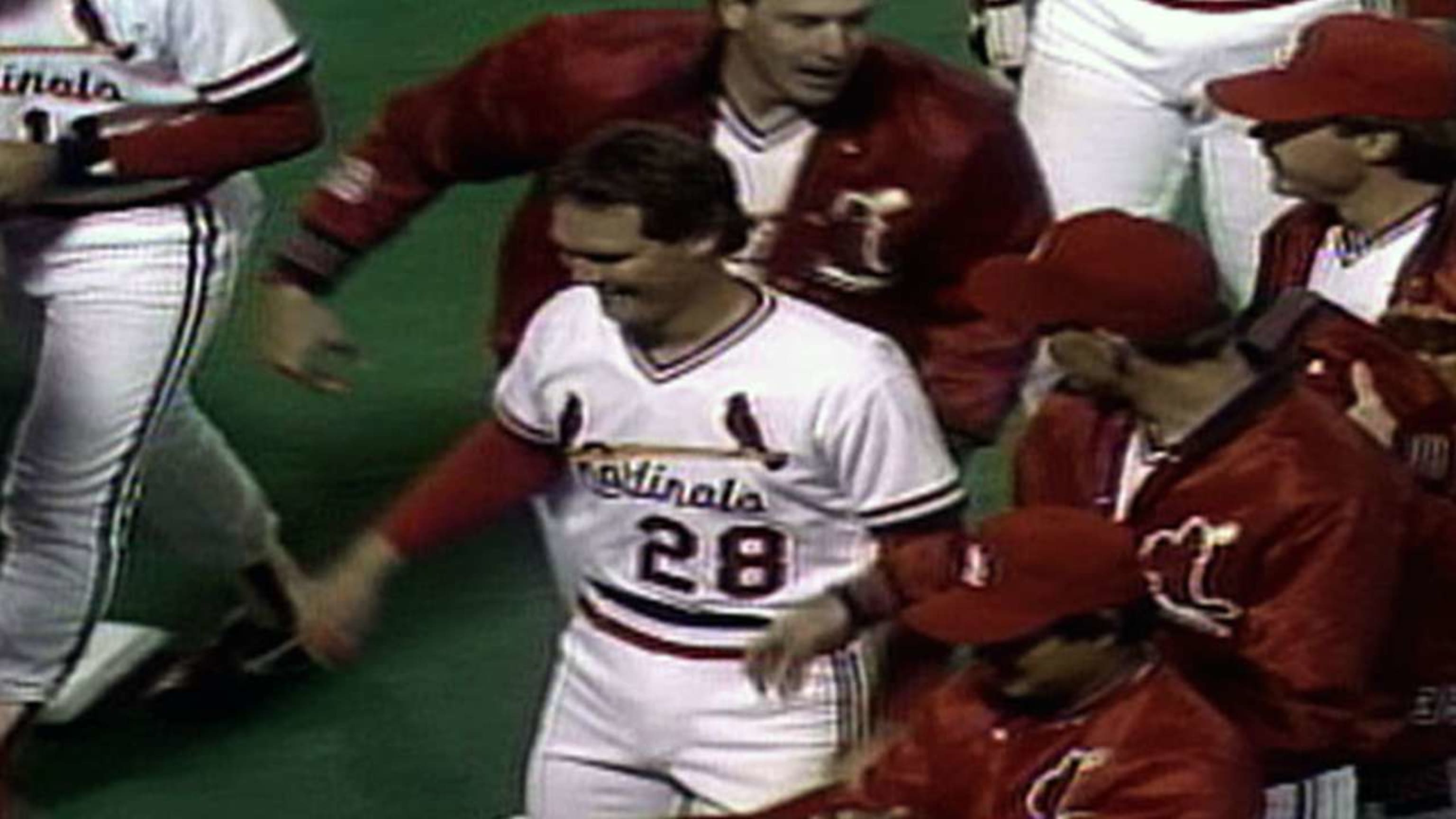 St. Louis Cardinals third base coach Jose Oquendo walks in the dugout  wearing the uniform of the St. Louis Stars of the Negro League before a  baseball game against the Pittsburgh Pirates