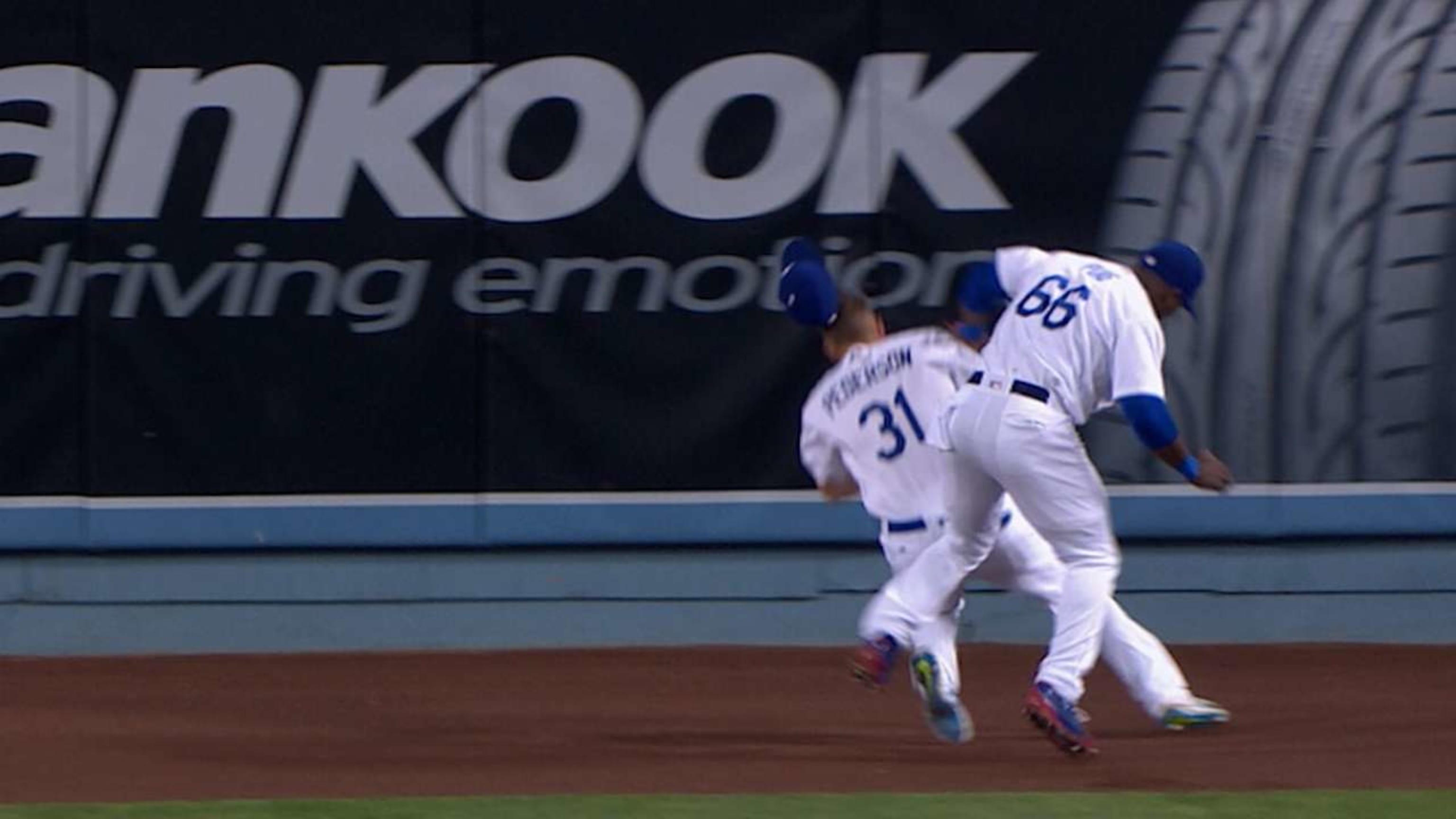 Puig, Pederson collide on catch