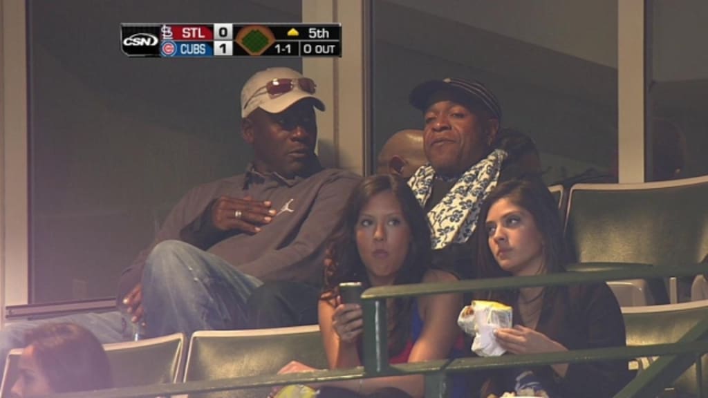 Michael Jordan takes in the game