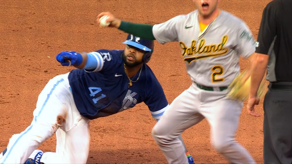 Kansas City Royals' Carlos Santana celebrates hitting an RBI