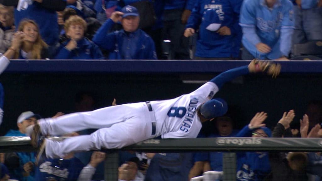 Moustakas goes over the railing to make the catch : r/baseball