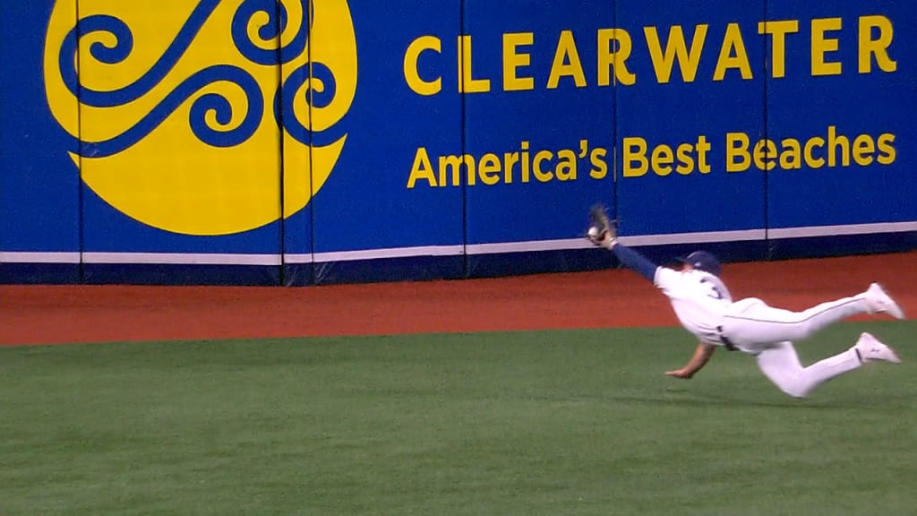Brett Phillips pitches, makes incredible catch