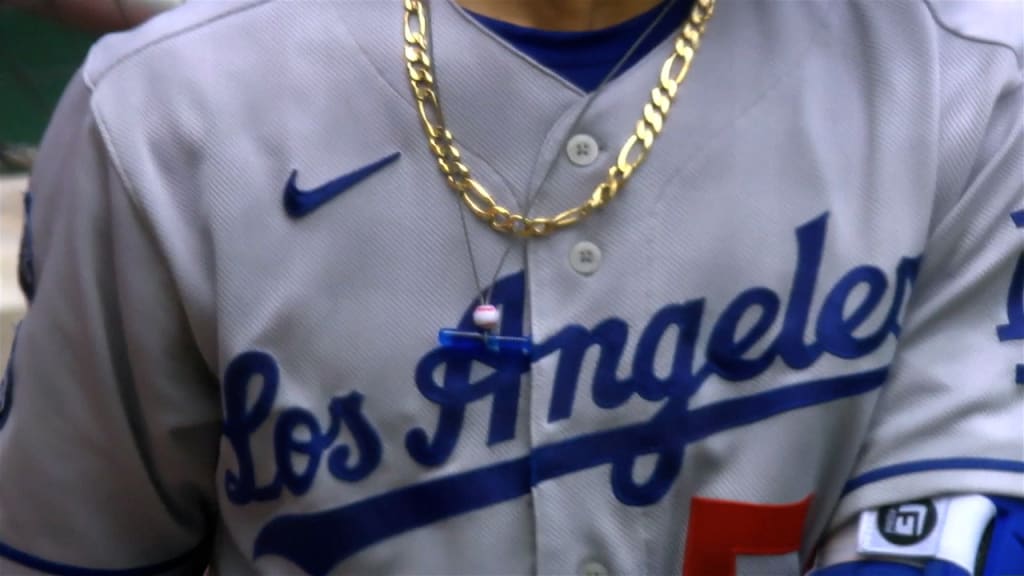 A detailed view of the necklace of Mookie Betts of the Los Angeles