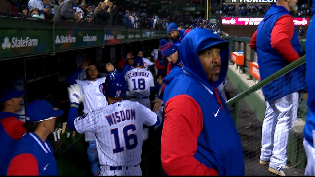 Patrick Wisdom of the Chicago Cubs in the dugout while playing the