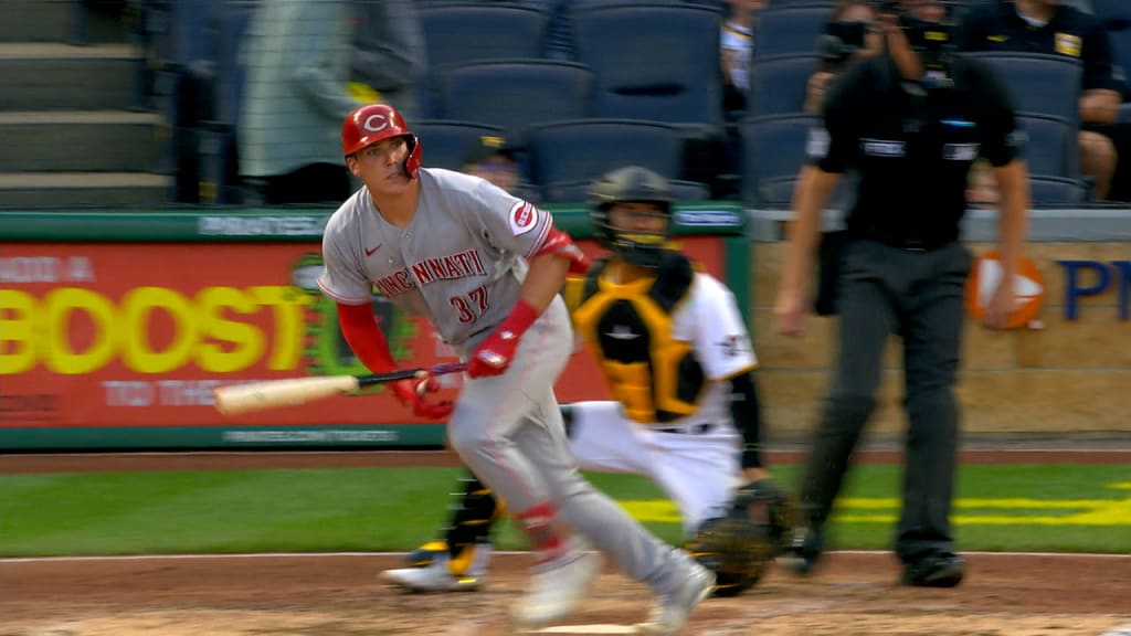 Cincinnati Reds' Tyler Stephenson blows a bubble as he runs the bases  during a baseball game